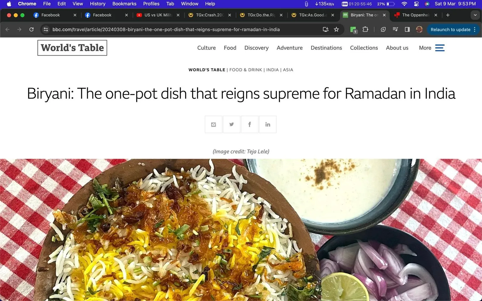 The image is a screenshot from a BBC article titled "Biryani: The one-pot dish that reigns supreme for Ramadan in India," published by World's Table. The article likely explores the cultural and culinary significance of biryani in India, particularly during Ramadan. The screenshot includes the headline and a photograph of biryani, a popular and flavorful rice dish. The biryani is presented in a bowl, showcasing vibrant colors with saffron-tinted rice, crispy fried onions, and garnished with herbs. Beside it is a small bowl of yogurt, possibly raita, and a plate of fresh sliced onions with a lime wedge. The table is covered with a red and white checkered cloth, adding a rustic touch to the setting. This combination of elements highlights the dish's rich textures and appealing presentation, making it visually inviting and culturally evocative. The article is categorized under "Food & Drink | India | Asia," indicating its focus on regional cuisine and traditions.
