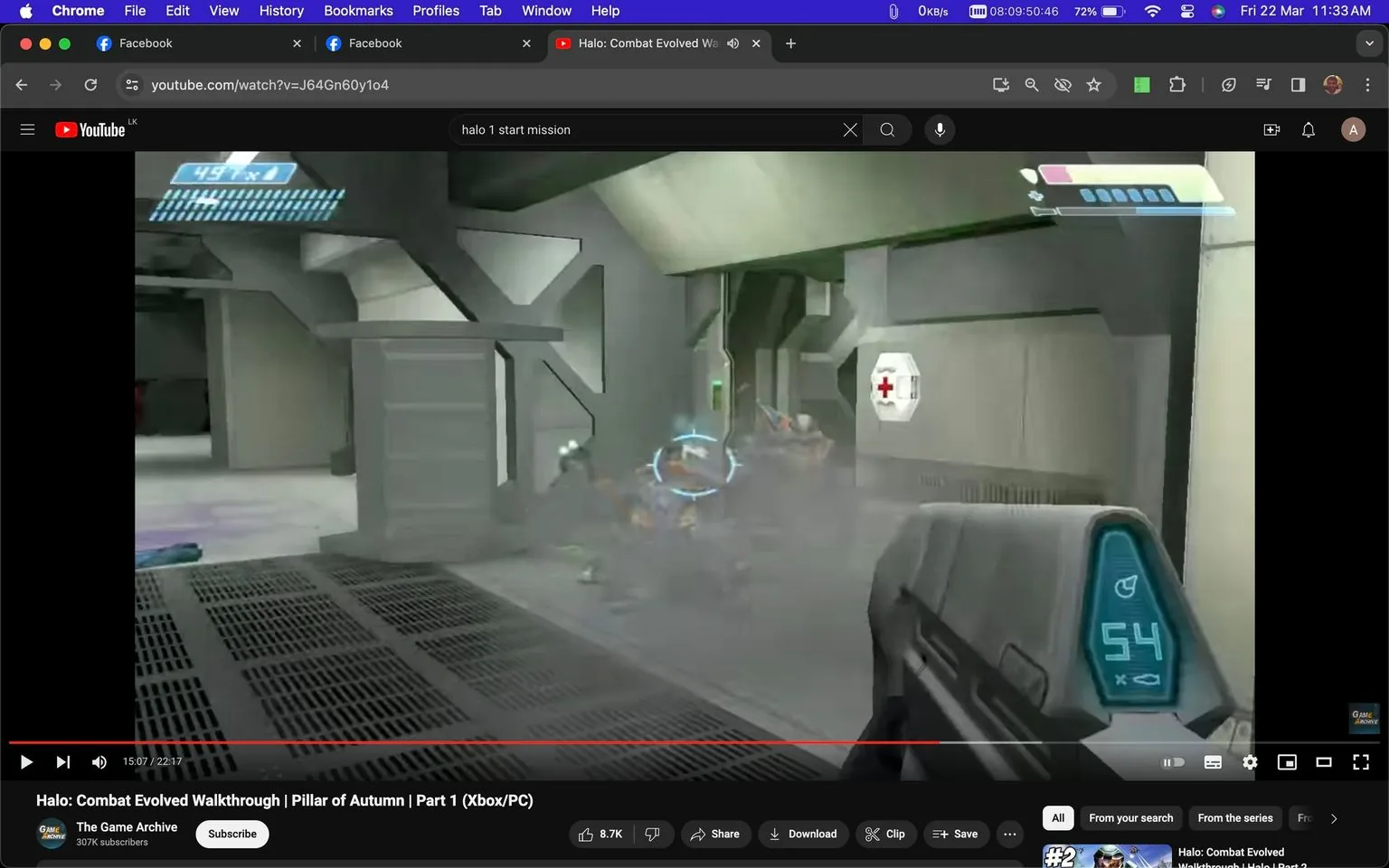 The image is a screenshot from a YouTube video titled "Halo: Combat Evolved Walkthrough | Pillar of Autumn | Part 1 (Xbox/PC)" from the channel The Game Archive. The video is a gameplay walkthrough of the iconic game "Halo: Combat Evolved." The scene depicts a first-person perspective typical in such games, where the player is navigating through a futuristic, industrial-looking corridor. The visual design includes metallic walls and a health pack visibly mounted on one side, indicative of the science fiction setting.
In the foreground, the player's weapon is visible, with a digital ammo counter displaying "54." The setting is tense, with the player seemingly engaged in combat, indicated by the crosshair focused on an adversary and visible smoke or dust from recent action. The environment is well-lit, emphasizing the industrial texture of the surroundings. This walkthrough video aims to guide players through the early stages of the game, explaining tactics and providing strategies for progress. The user interface, typical for first-person shooters, includes health and shield meters at the top of the screen, indicating the player's current status.