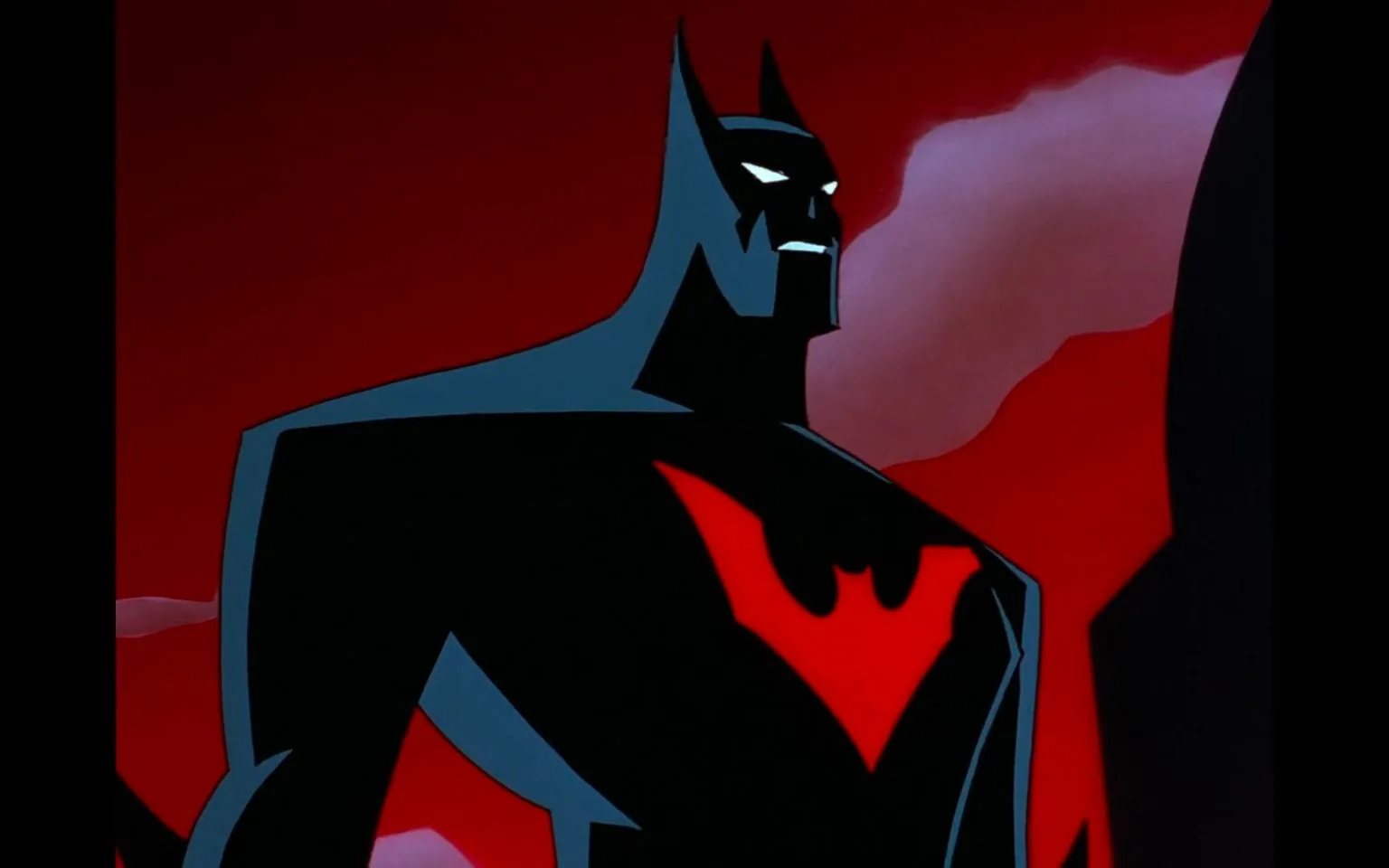 This illustration features Batman Beyond, a character from the animated series "Batman Beyond." The artwork is dramatic, set against a vivid red sky with scattered clouds, enhancing the intense atmosphere. Batman Beyond is depicted in his iconic suit, characterized by a sleek black design with a striking red bat symbol on the chest. His posture is powerful and imposing, suggesting readiness and vigilance. The character's mask covers his face, with pointed ears and white, narrow eye slits that add to the mysterious and futuristic aesthetic. The use of deep shadows and stark contrast emphasizes the character's muscular build and the angular design of his suit. The overall style reflects the animated medium, with bold outlines and a minimalist yet dynamic approach to color and form, capturing the essence of the series' futuristic and edgy theme.