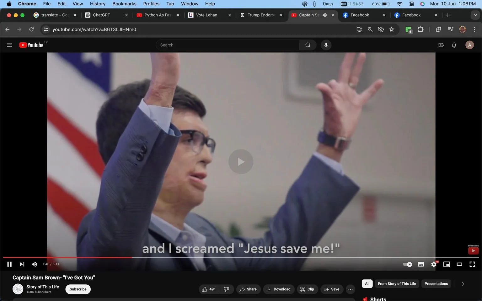 The image is a screenshot from a YouTube video titled "Captain Sam Brown - 'I've Got You.'" It shows a man, referred to as Captain Sam Brown, in a mid-speech pose with his arms raised and an earnest expression. He is wearing a suit with a light blue shirt, and he has glasses on. Behind him, part of an American flag can be seen, indicating a setting that likely involves a formal or patriotic context, such as a speech or presentation.
The video appears to be hosted on the YouTube channel "Story of This Life," which has 160K subscribers. The subtitles at the bottom of the screen display the text "and I screamed 'Jesus save me!'," suggesting the content might involve a personal story or testimony. The visual focus is on Captain Sam Brown, who is positioned prominently, suggesting the video centers on him sharing an impactful or emotional narrative. The lighting is bright and indoor, highlighting the formal attire and the gesture of speaking passionately. The ambiance conveys a serious and possibly inspiring tone.