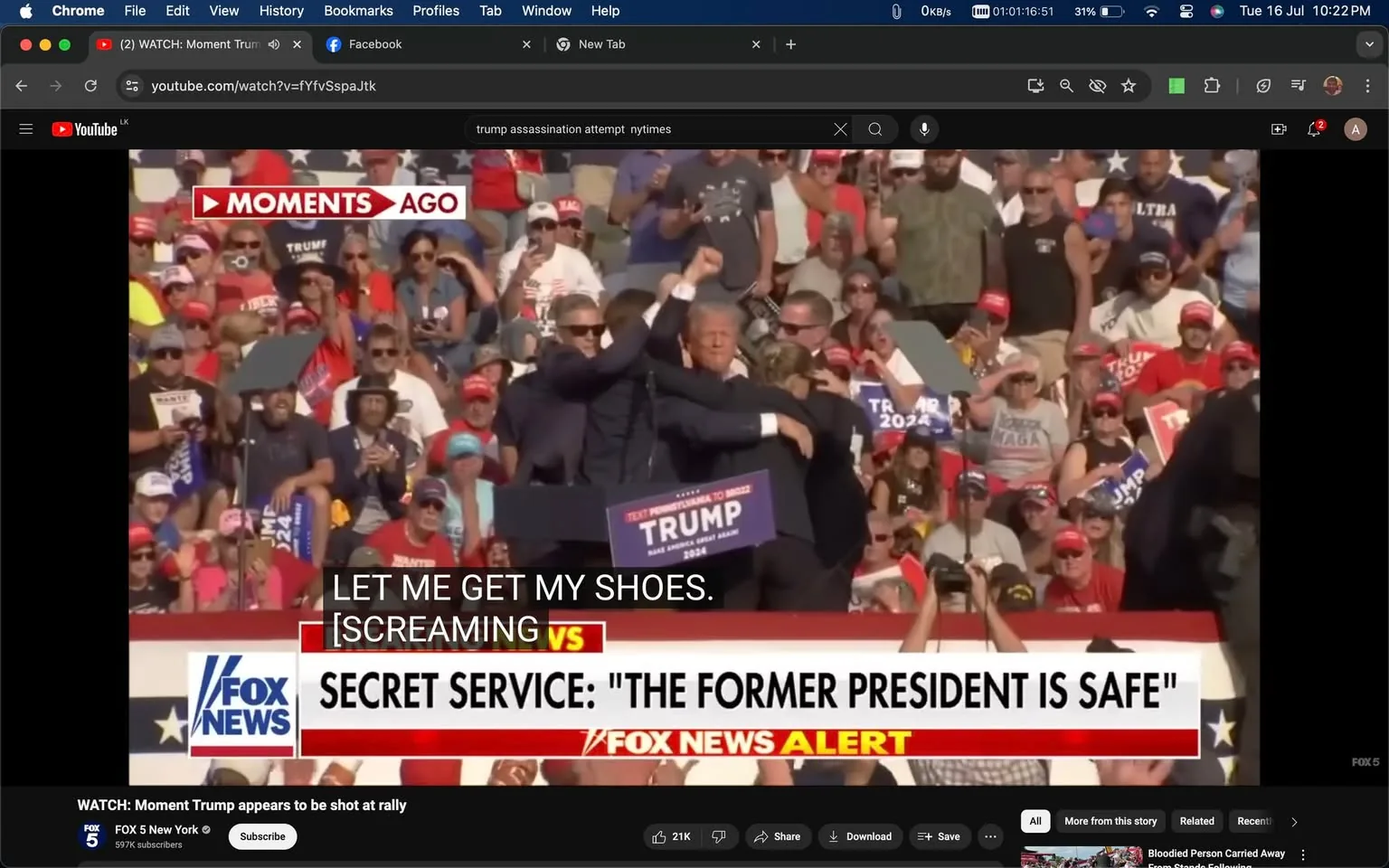 In the image, Donald Trump is standing at a podium during a rally. He is surrounded by individuals, likely security personnel, who seem to be ensuring his safety. The individual labeled as Sean Curran is part of this group. The scene is outdoors with a large crowd of spectators visible in the background, many wearing red hats and holding signs. The atmosphere appears tense, indicated by the people around Donald Trump and the text overlay on the screen. The podium has a "TRUMP" sign on it, and the crowd is densely packed, suggesting a well-attended event. The lighting is bright, typical of an outdoor daytime event, with vibrant colors from the attendees' clothing and signs. On-screen text announces a "FOX NEWS ALERT" with a message stating, "SECRET SERVICE: 'THE FORMER PRESIDENT IS SAFE.'" The subtitle reads, "LET ME GET MY SHOES. [SCREAMING]," indicating a chaotic moment captured in this screenshot.
- Title: "WATCH: Moment Trump appears to be shot at rally"
- Channel / profile: "FOX 5 New York"
- Site / app: "YouTube"
- Captions / subtitles: "LET ME GET MY SHOES. [SCREAMING]"