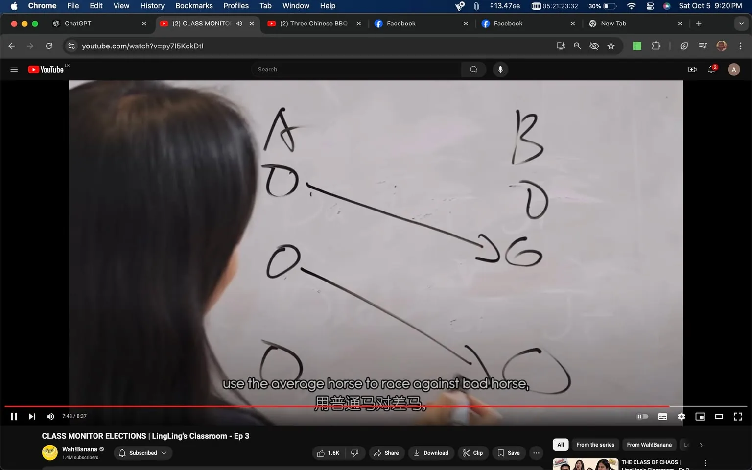 The screenshot shows a scene from a YouTube video titled "CLASS MONITOR ELECTIONS | LingLing's Classroom - Ep 3" on the channel Wah!Banana. The setting appears to be an educational environment, likely a classroom. The focus is on a person writing on a whiteboard, which is partially visible. The whiteboard has several letters and arrows drawn on it, including "A," "B," and multiple "O"s, indicating a possible strategy or plan being discussed.
The person in the image is facing the board, and the camera captures them from behind, emphasizing their involvement in teaching or explaining something. The lighting is bright and typical of an indoor classroom setting. The subtitles in the image read, "use the average horse to race against bad horse," suggesting a metaphorical strategy being explained. The video likely explores themes of classroom dynamics and decision-making in a humorous or educational context, typical of Wah!Banana's content.