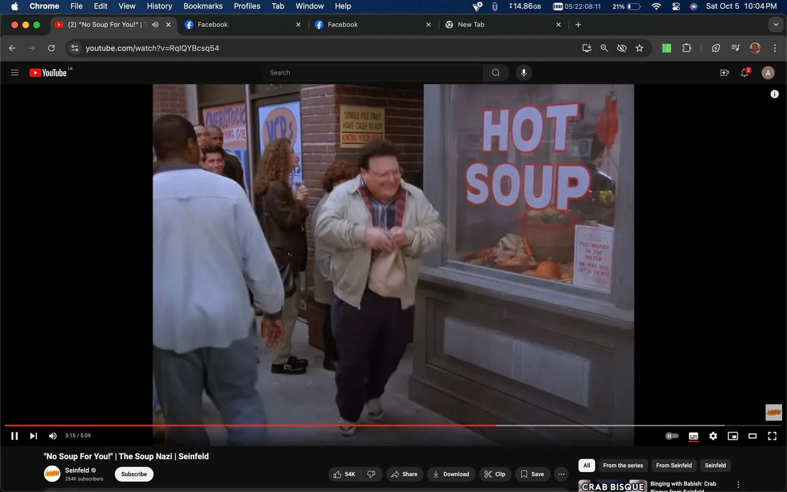 The image is a frame from a video on YouTube titled "No Soup For You! | The Soup Nazi | Seinfeld." It shows a scene from the popular sitcom "Seinfeld." The character played by Wayne Knight is visible, exiting a shop with a sign reading "HOT SOUP" in large letters on the window. The background features a brick wall and a sign that reads "PUT MONEY IN THE METER OR YOU WILL GET A TICKET," suggesting a street setting. Several other people are in line near the entrance, indicating a busy or popular location.
Wayne Knight's character appears to be leaving the shop, smiling and clutching something, likely a soup container, given the context. He is wearing a light-colored jacket over a plaid shirt, suggesting casual attire. The scene captures a comedic and iconic moment from the series, known for its humor and memorable lines. The lighting is bright, typical of daytime outdoor scenes, adding a lively and bustling atmosphere to the image.
- Title: "No Soup For You! | The Soup Nazi | Seinfeld"
- Channel / profile: "Seinfeld"
- Site / app: "YouTube"