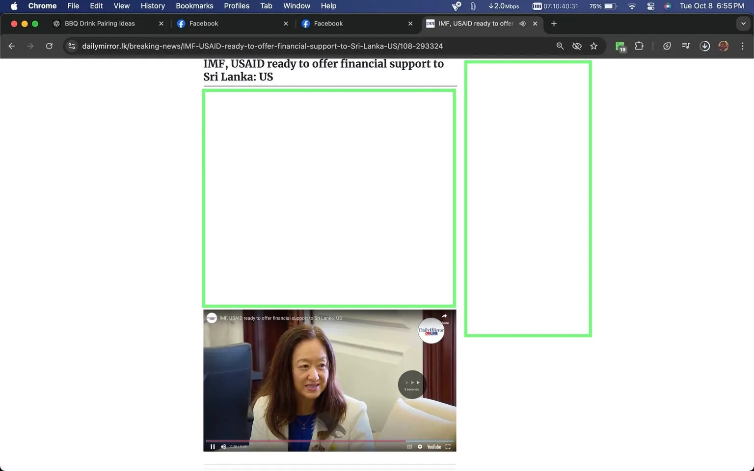 The image is a screenshot from the Daily Mirror website, featuring an article titled "IMF, USAID ready to offer financial support to Sri Lanka: US." The headline is prominently displayed at the top of the page. Below the headline, there is a video still showing Julie Chung, who appears to be engaged in a conversation or interview. Julie Chung is wearing a light-colored blazer over a blue top, seated in what looks like an office setting. She is facing the camera, with a calm and engaged expression. The lighting in the room is bright and even, suggesting a formal environment. On the video still, the Daily Mirror logo is visible in the top right corner, indicating the source of the content. The browser tabs at the top of the screenshot show various open websites, including Facebook and a BBQ drink pairing ideas page. The browser interface indicates it's a Chrome window on a macOS system, with details about network status and time displayed at the top right.