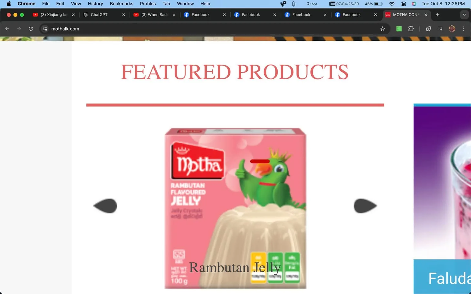 This image is a screenshot from the website "mothalk.com," displaying a section titled "FEATURED PRODUCTS." The central focus is on a product called "Motha Rambutan Flavoured Jelly." The packaging is designed with a pink background and features a whimsical illustration of a green creature with a crown, giving a thumbs-up next to a jelly dessert. The product is described as "Jelly Crystals" and is available in a 100g pack. The Motha logo is prominently displayed on the top left corner of the packaging. The overall design is colorful, featuring red and green tones that complement the pink background. The website appears to be showcasing various food products, and the screenshot captures a professional and inviting product display.