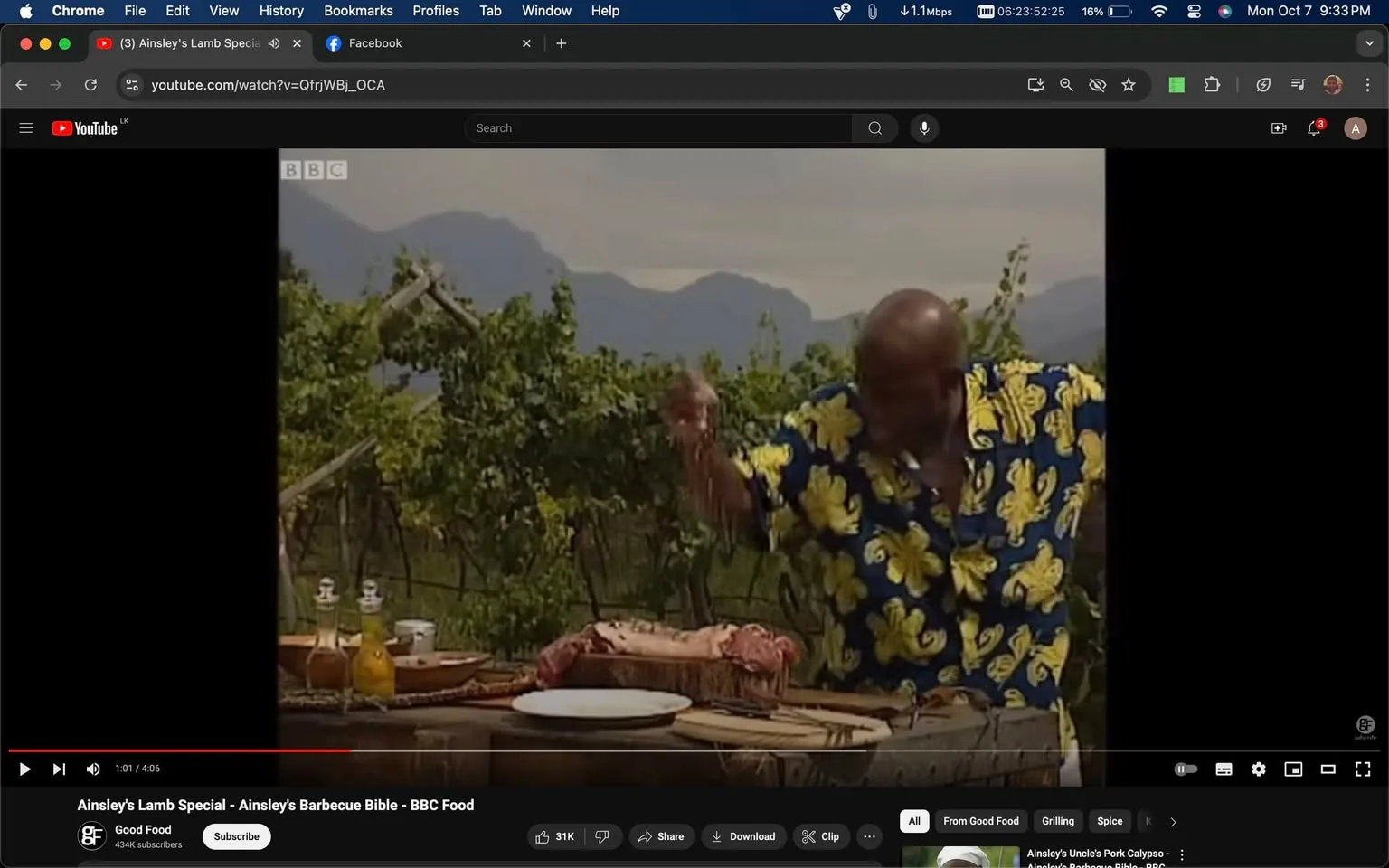 Ainsley, identified as "ainsley the chef," is featured in this vibrant outdoor cooking scene from a YouTube video titled "Ainsley's Lamb Special - Ainsley's Barbecue Bible - BBC Food." The video is hosted on the Good Food channel, associated with the BBC. Ainsley is positioned at a rustic outdoor setting, likely a vineyard, as indicated by the rows of grapevines in the background and distant mountains, which create an idyllic and serene backdrop.
In the scene, Ainsley energetically seasons a piece of lamb placed on a wooden cutting board. He wears a lively patterned shirt with bold yellow floral designs against a dark background, adding a burst of color to the setting. The table is set with various bottles of oil or vinegar, reflecting the culinary theme. The lighting suggests a sunny day, illuminating the scene and highlighting Ainsley's dynamic cooking style. The video falls under topics such as cooking, barbecue, and lamb, part of a series named "Ainsley's Barbecue Bible," showcasing his distinct culinary flair.
- Title: "Ainsley's Lamb Special - Ainsley's Barbecue Bible - BBC Food"
- Channel / profile: "Good Food"
- Site / app: "YouTube"