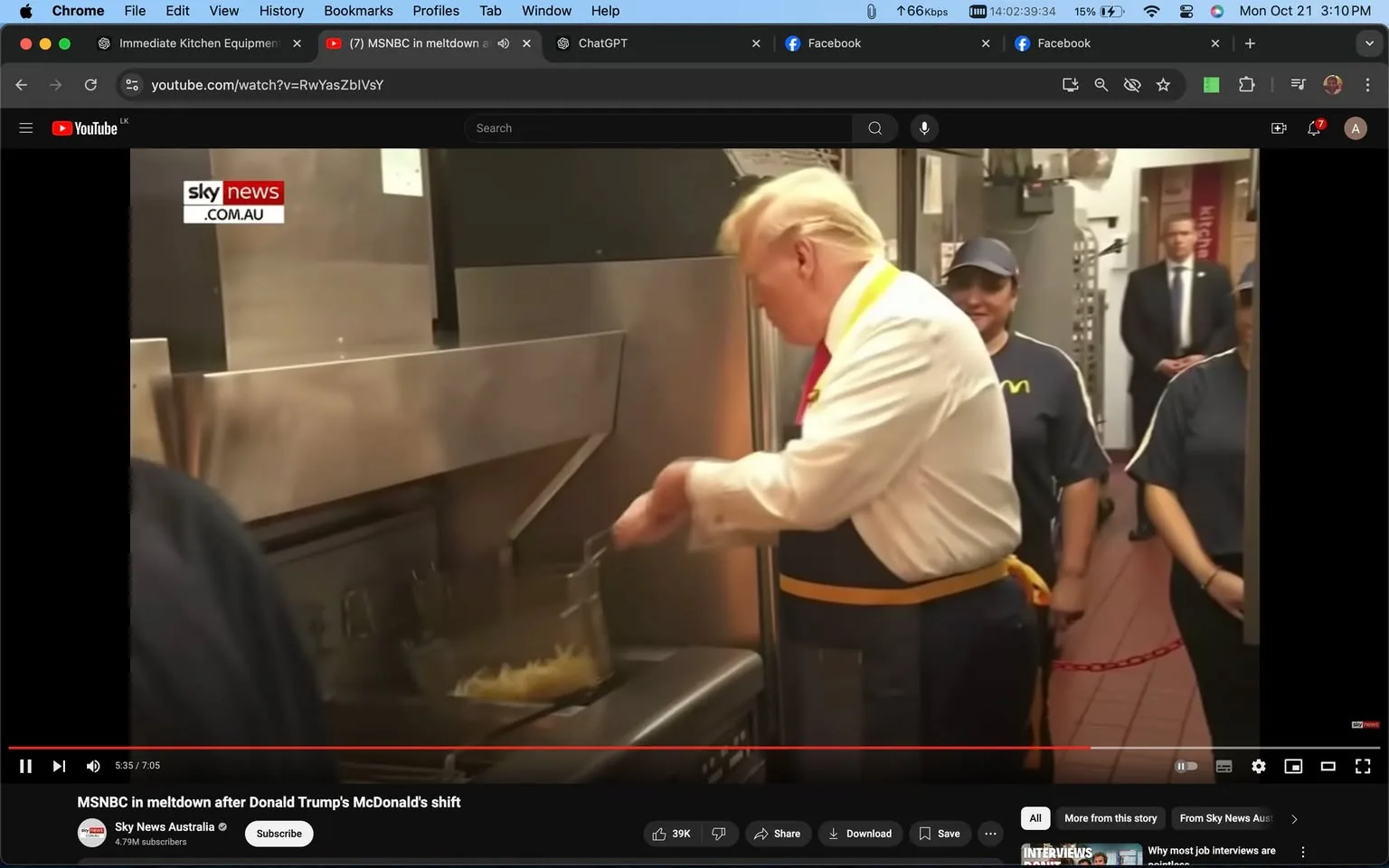 Donald Trump is depicted in this YouTube screenshot from a video titled “MSNBC in meltdown after Donald Trump's McDonald's shift.” The scene takes place in a McDonald's kitchen, where Donald Trump is engaged in cooking, specifically frying food. He is wearing a white shirt with rolled-up sleeves and an apron, indicating participation in a cooking activity. In the background, McDonald's employees in uniform watch on, and a man in a suit stands near a doorway. The setting is a professional kitchen with stainless steel equipment including fryers and a tiled floor. The lighting is typical of indoor commercial spaces, bright and even, highlighting the activity in the foreground. The video is hosted on the Sky News Australia channel, and the visible overlay text includes "sky news" and ".COM.AU," confirming the video source.
- Title: "MSNBC in meltdown after Donald Trump's McDonald's shift"
- Channel / profile: "Sky News Australia"
- Site / app: "YouTube"