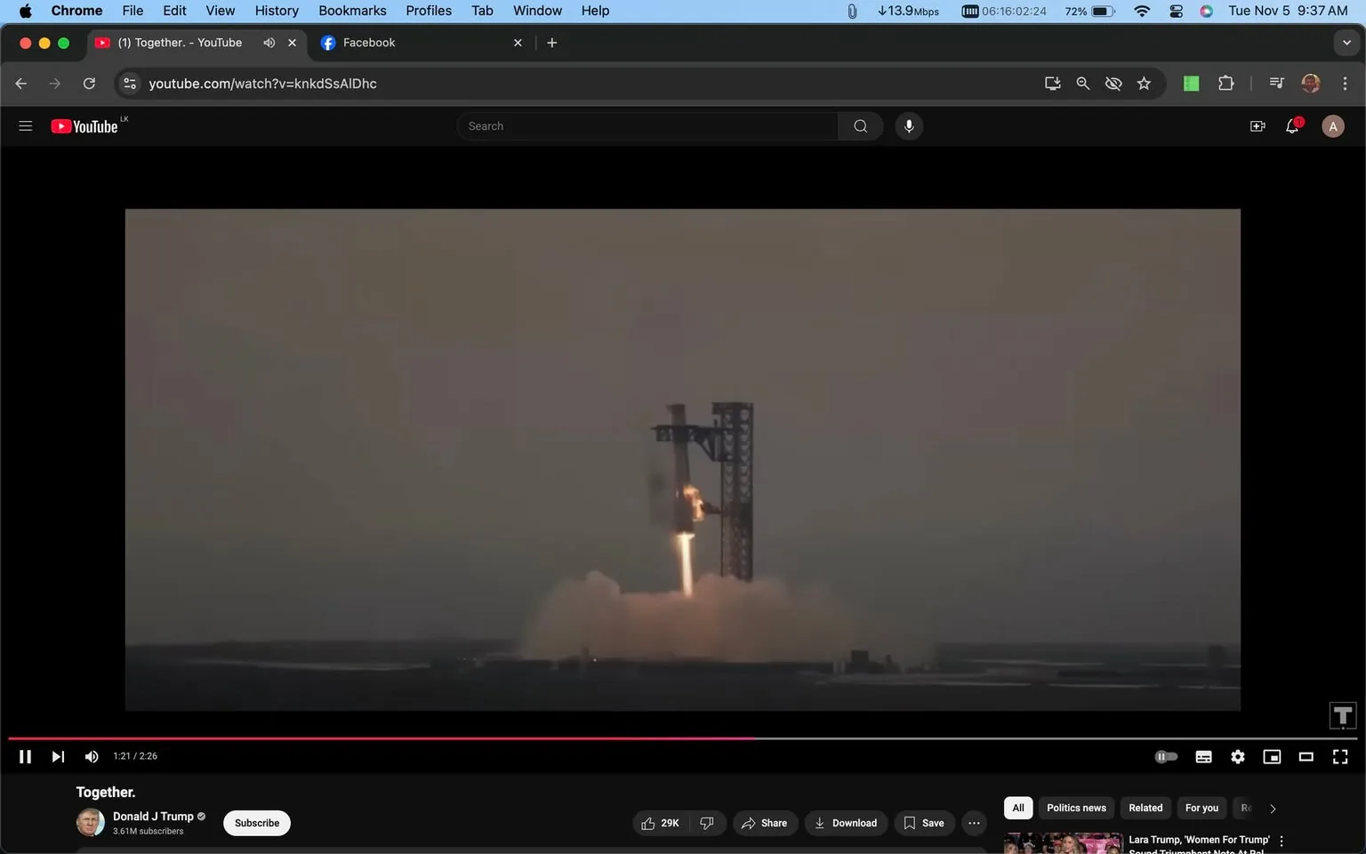 The image is a screenshot from a YouTube video titled "Together." The video is hosted on the channel "Donald J Trump," which has 3.61 million subscribers. The scene captured in the screenshot shows a rocket launch taking place at dawn or dusk, with the sky appearing dimly lit. The rocket is ascending from the launch pad, with flames and smoke visible at its base, suggesting the powerful thrust of the engines. In the background, there's a tall structure likely used for launch support.
The interface is a typical YouTube layout, with the video player controls visible at the bottom, including options like play, share, download, save, and like/dislike buttons. The video is paused at 1 minute and 21 seconds into a total duration of 2 minutes and 26 seconds. The screen also shows a browser window with open tabs, including Facebook and some other sites, at the top of the screenshot.