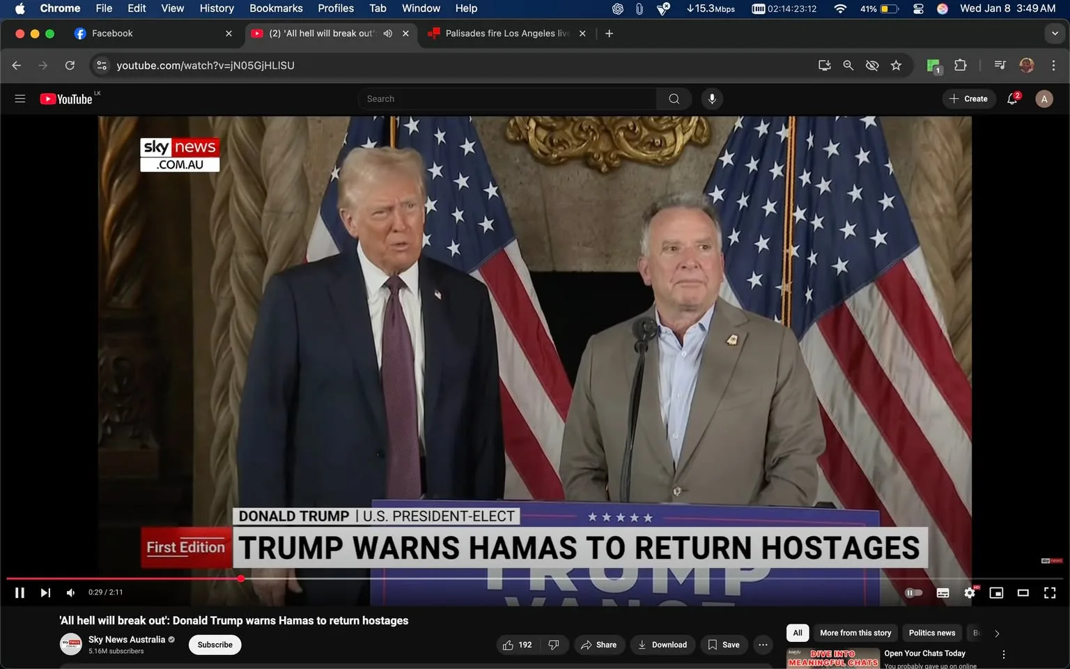 In the image, a press event is taking place featuring a public figure, who is speaking into a microphone. He is dressed in a dark suit with a white shirt and a red tie. Next to him stands another individual in a light-colored blazer and a collared shirt, appearing attentive. Behind them are two large American flags, indicating a political setting. The backdrop features ornate decor, suggesting an indoor venue. The text overlay reads "TRUMP WARNS HAMAS TO RETURN HOSTAGES," indicating the topic of the press conference. The logo for Sky News is visible in the corner, confirming the source of the broadcast. The overall atmosphere appears serious, reflecting the gravity of the subject matter being discussed.