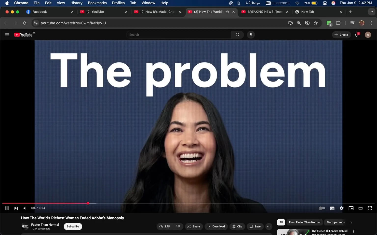 In the image, a smiling individual is prominently featured against a blue background. The person has long, dark hair and is wearing a black top. Their expression is joyful, with a broad smile that suggests a positive or engaging context. Above them, in large white text, the phrase "The problem" is displayed, indicating that this may be part of a video or presentation discussing a specific issue. The setting appears to be a digital platform, likely a video, as indicated by the YouTube interface visible at the bottom of the image. There are no visible brands or logos in the image.