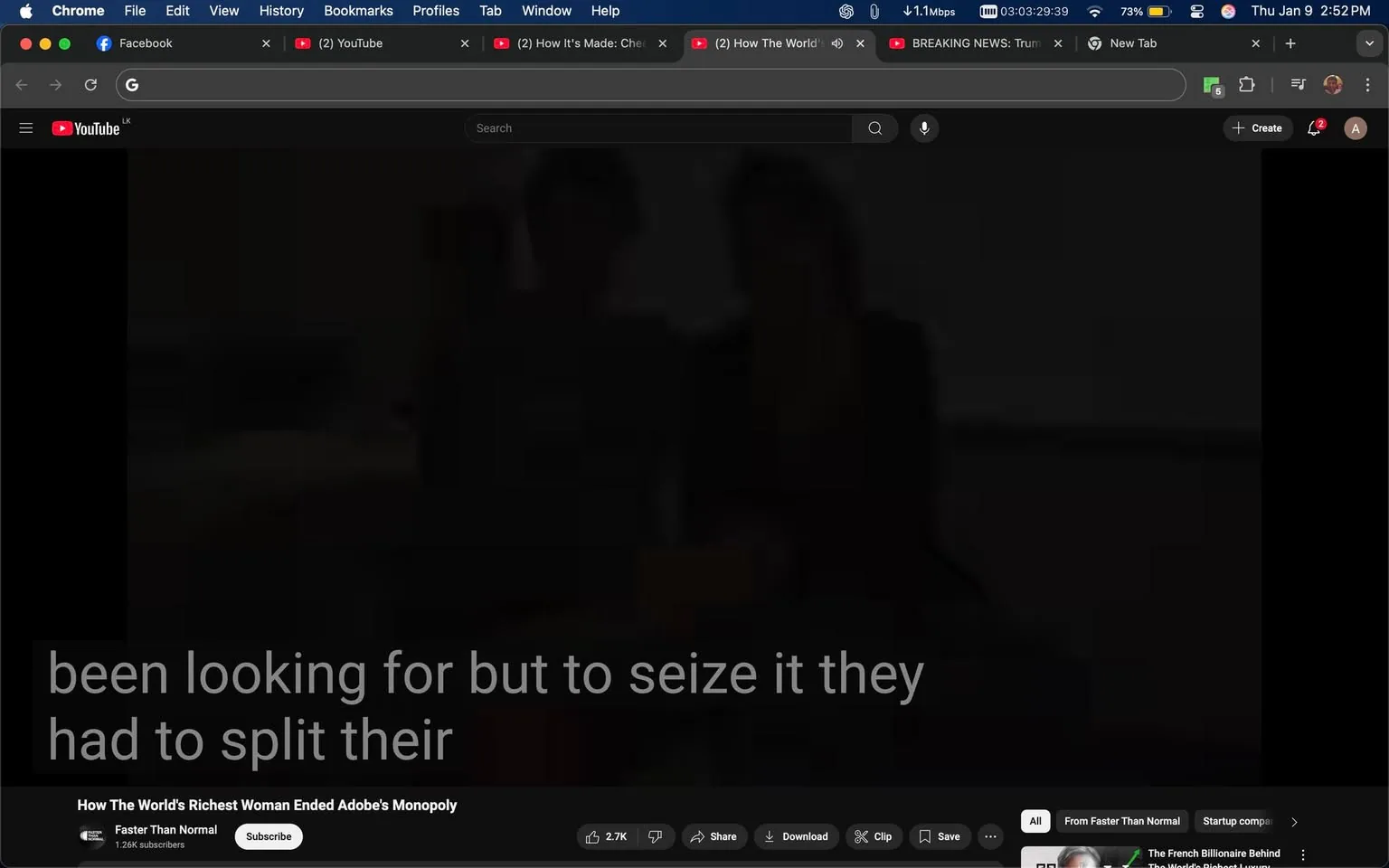 The image features a darkened scene with two unidentified adults partially visible in the background. The focus is on the text overlay, which reads, "How The World's Richest Woman Ended Adobe's Monopoly," indicating the title of a video. Below this, there is additional text that appears to be a subtitle or caption, stating, "been looking for but to seize it they had to split their." The YouTube interface is visible at the top, with various tabs and icons, including a subscribe button for the channel "Faster Than Normal," which has 1.26K subscribers. The overall setting appears to be a video playback screen, likely indoors, with no discernible details about the individuals present.