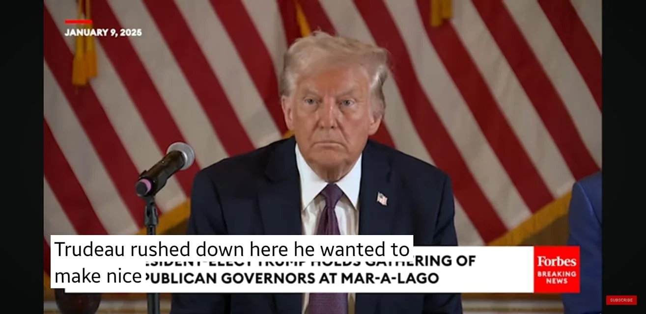 In the image, a notable public figure is seated at a table during a gathering of Republican governors at Mar-a-Lago, as indicated by the visible text. The individual appears serious, with a focused expression, and is dressed in a dark suit with a white shirt and a tie. Behind them, there are multiple American flags, suggesting a formal setting. The date displayed is January 9, 2025. The lower part of the image contains text that mentions Trudeau and the context of making nice, along with a logo for Forbes, indicating the source of the news. The overall atmosphere seems to be one of political discussion or announcement.