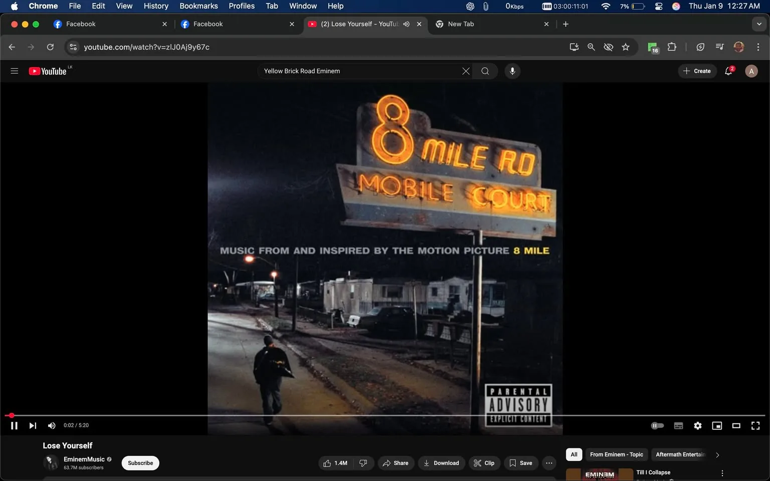 The image features the album cover for "8 Mile," which includes a prominent neon sign reading "8 MILE RD MOBILE COURT." The setting appears to be a nighttime street scene, likely depicting a mobile home park or similar area. A figure is seen walking down the road, dressed casually with a backpack. The background includes several mobile homes and streetlights illuminating the scene. The text "MUSIC FROM AND INSPIRED BY THE MOTION PICTURE 8 MILE" is displayed prominently, along with a parental advisory label indicating explicit content. The album is associated with Eminem, as indicated by the branding in the lower left corner.