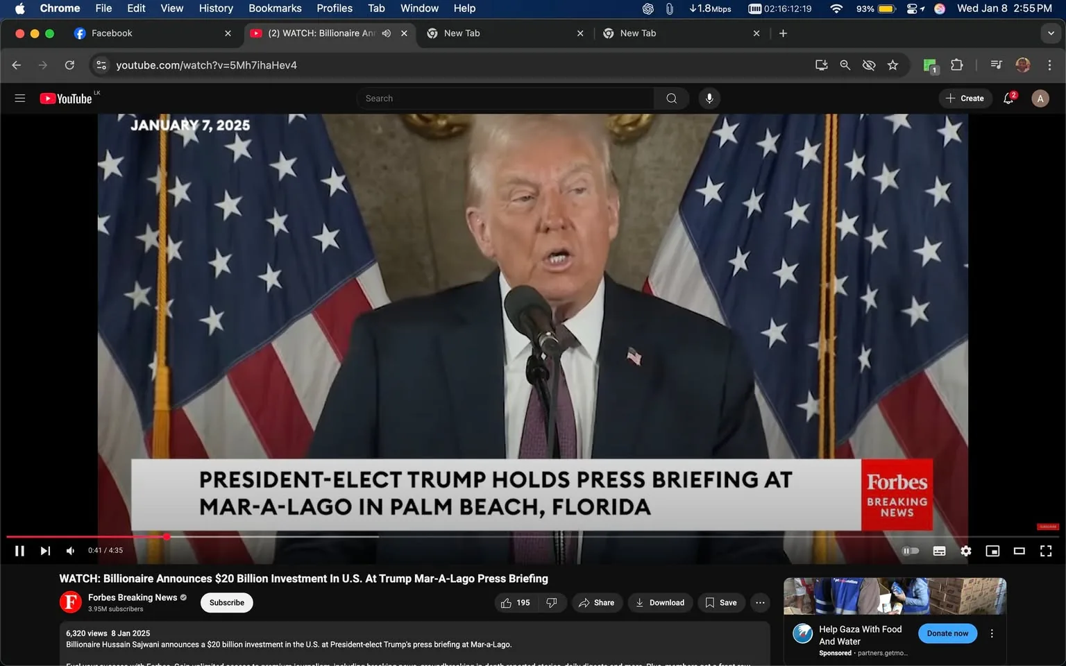 In the image, a press briefing is taking place, featuring a speaker at a podium with a microphone. The speaker is dressed in a dark suit and appears to be addressing an audience. Behind them are two large American flags, prominently displayed, indicating the setting is formal and likely political. The date "JANUARY 7, 2025" is visible, suggesting this is a recent event. The lower part of the image includes a caption from Forbes, indicating the source of the broadcast. The overall atmosphere is serious, typical of a press briefing context.