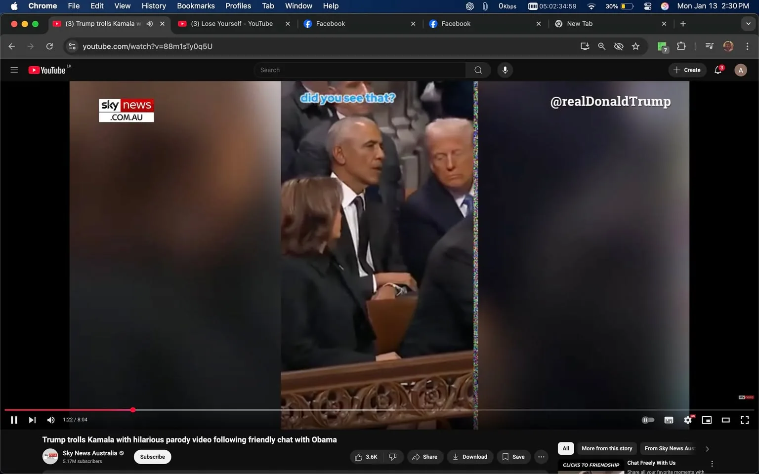 In the image, a group of individuals is seated in a formal setting, likely during a significant political event. Two prominent figures are visible: one appears to be engaged in conversation, while the other seems to be listening attentively. The individual on the left is dressed in a dark suit and tie, with short hair, while the person on the right has a similar formal attire. The atmosphere suggests a serious or important discussion, with the audience around them also dressed in formal clothing. The background features ornate architectural elements typical of a grand venue. There are no visible logos or brands in the image.