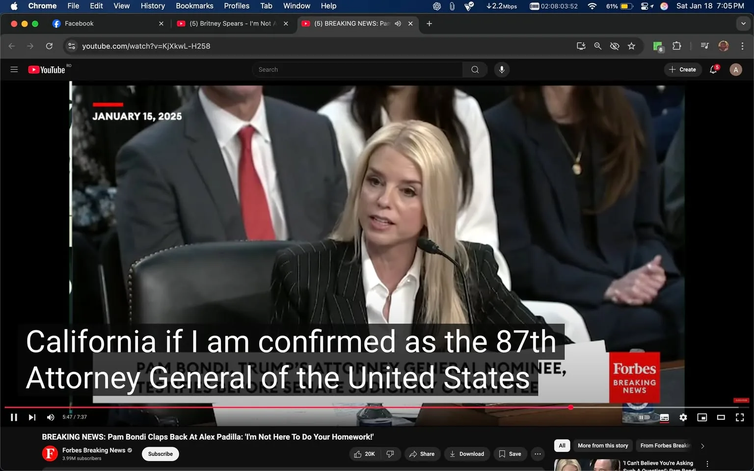 During a confirmation hearing, a woman with long blonde hair, dressed in a black and white pinstriped suit, is speaking into a microphone. She appears to be addressing a panel, discussing her potential confirmation as the 87th Attorney General of the United States. The setting is formal, likely indoors, with several individuals seated behind her, including a man in a gray suit with a red tie. The background includes a sign with the name "Forbes Breaking News," indicating the source of the video. The overall atmosphere suggests a serious political context, with no visible signs of violence or sexual content.
