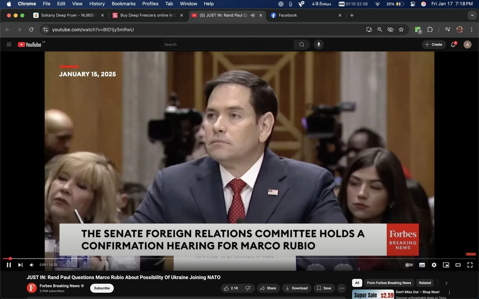 The Senate Foreign Relations Committee is holding a confirmation hearing, prominently featuring a man in a suit with a tie, who appears to be the main subject of the event. He has a serious expression and is seated at a table with microphones in front of him. The background includes several cameras and individuals, indicating a formal setting likely related to government proceedings. A woman with blonde hair is visible to his left, appearing engaged in the discussion. The date displayed on the screen is January 15, 2025, and the lower part of the image features text from Forbes Breaking News, indicating the source of the video. The overall atmosphere suggests a significant political event, with a focus on the confirmation process.