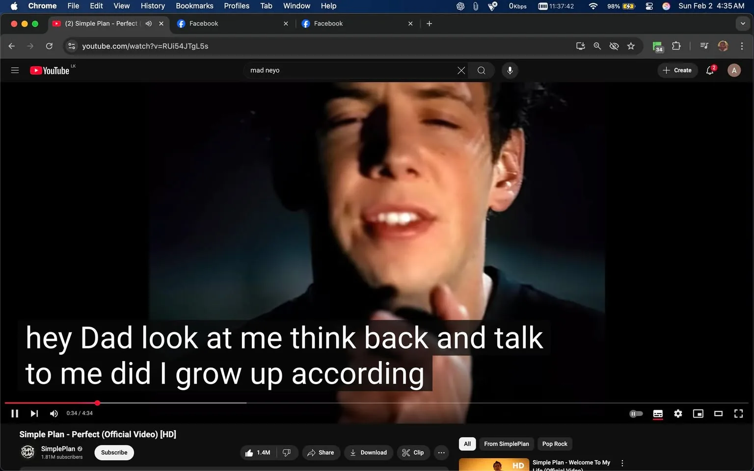 In the image, a young man is seen singing passionately, with his eyes partially closed and a focused expression on his face. He appears to be in a music video setting, likely performing a song. The background is dimly lit, creating a dramatic atmosphere that emphasizes his expression. The lyrics "hey Dad look at me think back and talk to me did I grow up according" are displayed prominently at the bottom of the screen, suggesting themes of reflection and communication. The video is hosted on YouTube, as indicated by the logo in the bottom left corner. The overall mood of the scene is emotional, capturing a moment of introspection. There are no visible signs of violence, sexual content, or brands other than YouTube.