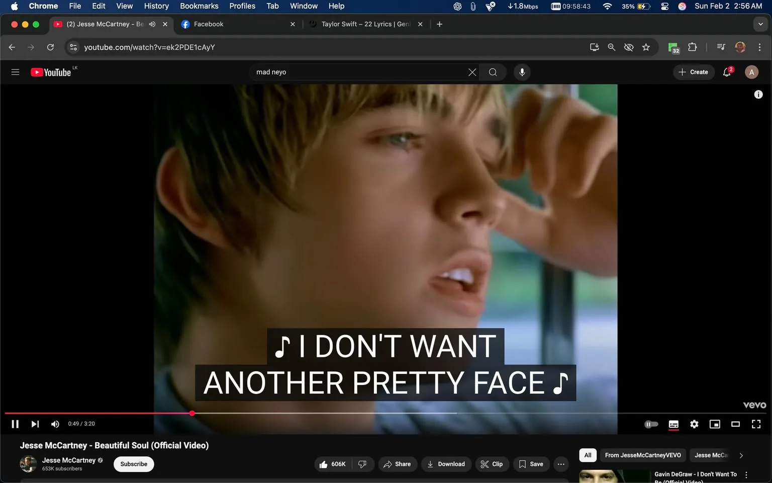 In the image, a young male singer is prominently featured, appearing to be in a moment of contemplation or expression. He has light brown hair styled in a slightly tousled manner, and his eyes are focused, suggesting a deep emotional connection to the lyrics being sung. The background is blurred, indicating that the setting might be indoors, possibly within a vehicle or a similar enclosed space. 

The visible text overlay includes lyrics from the song "Beautiful Soul," stating, "I DON'T WANT ANOTHER PRETTY FACE," which suggests a theme of longing or desire. The video appears to be from a music platform, as indicated by the YouTube interface at the bottom, which includes options for subscribing, sharing, and downloading. The overall mood of the image is reflective, with the singer's expression conveying a mix of vulnerability and sincerity. There are no visible brands or logos in the image, and no elements of violence or sexual content are present.