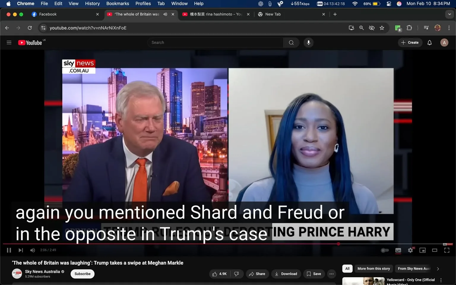 The image depicts a split-screen video call format featuring two individuals. 

**Left Side:**
- A man is seated, wearing a dark blue suit with a white shirt and an orange tie. He has short, light-colored hair and appears to be in a mid-conversation state, with a slight frown on his face, suggesting he is engaged in a serious discussion. The background behind him shows a city skyline with tall buildings, indicating a professional or news studio setting. The logo "sky news" is visible in the top left corner, along with the text ".com.au," indicating this is an Australian news outlet.

**Right Side:**
- A woman is also seated, appearing to be in a well-lit indoor space. She has long, straight black hair and is wearing a light gray turtleneck sweater. Her expression is calm and friendly, with a slight smile. She has a pair of hoop earrings visible. The background behind her is a neutral-colored wall, and there is a wooden door partially visible, suggesting a home or office environment.

**Text Elements:**
- At the bottom of the image, there is a caption that reads: "again you mentioned Shard and Freud or in the opposite in Trump's case." This text appears to be part of the ongoing conversation. 
- The lower part of the image features a banner that states: "‘The whole of Britain was laughing’: Trump takes a swipe at Meghan Markle," indicating the topic of discussion. 
- There are also viewer engagement metrics visible, such as "4.9K" (likely indicating likes) and "5.29M subscribers" for the channel, suggesting a significant audience.

**Overall Setting:**
- The image is set within a digital media context, likely a news segment or interview format, where current events or public figures are being discussed. The visual elements suggest a professional atmosphere typical of news broadcasts.