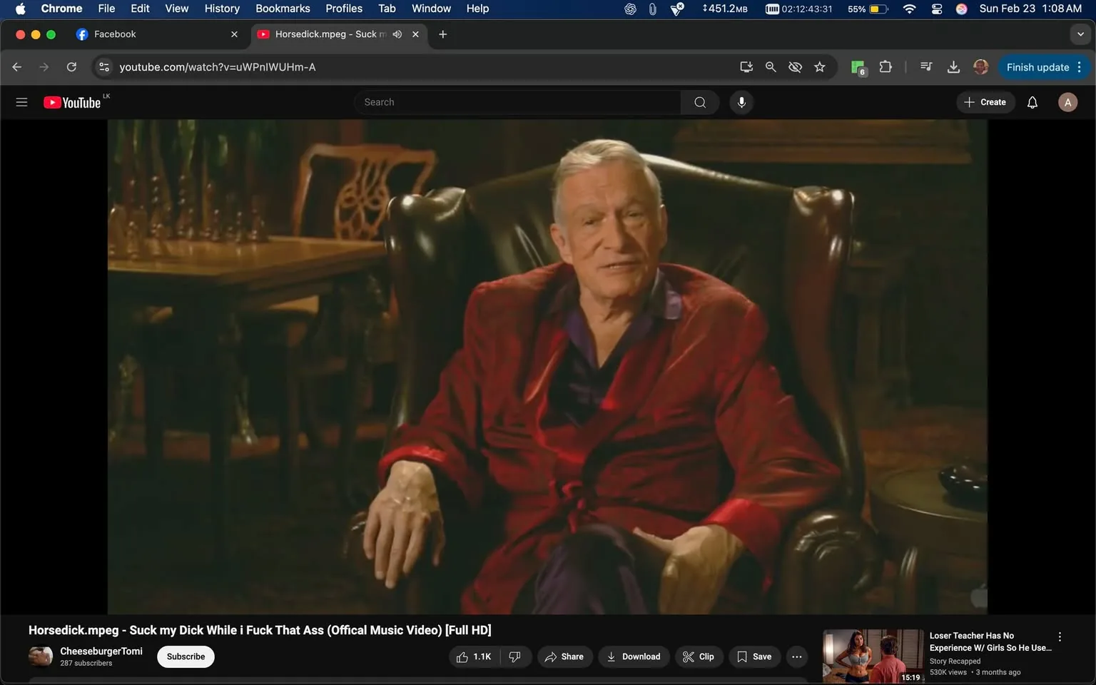 The image depicts a man seated in a large, plush armchair. He is wearing a red velvet robe with a shawl collar, which has a deep purple lining. The robe appears luxurious and is tied at the waist with a matching sash. Underneath the robe, he is wearing a black shirt, which is partially visible. The man has short, slicked-back gray hair and is displaying a slight smile, suggesting a relaxed demeanor. His skin appears fair, and he has visible wrinkles, indicating an older age.

In the background, there is a wooden table with a chess set arranged on it, suggesting a cozy or intimate setting. The table is dark wood, and the chess pieces are made of a contrasting material, possibly plastic or wood, with a classic design. Behind the man, there are wooden chairs that also appear to be elegantly designed, contributing to the overall sophisticated atmosphere of the room.

The lighting in the image is warm and soft, creating a comfortable ambiance. The walls are not clearly visible, but the overall setting gives the impression of a well-furnished room, possibly a study or a lounge area. There are no visible logos, trademarks, or readable text in the image. The focus remains on the man and his attire, along with the surrounding furniture that enhances the setting's elegance.