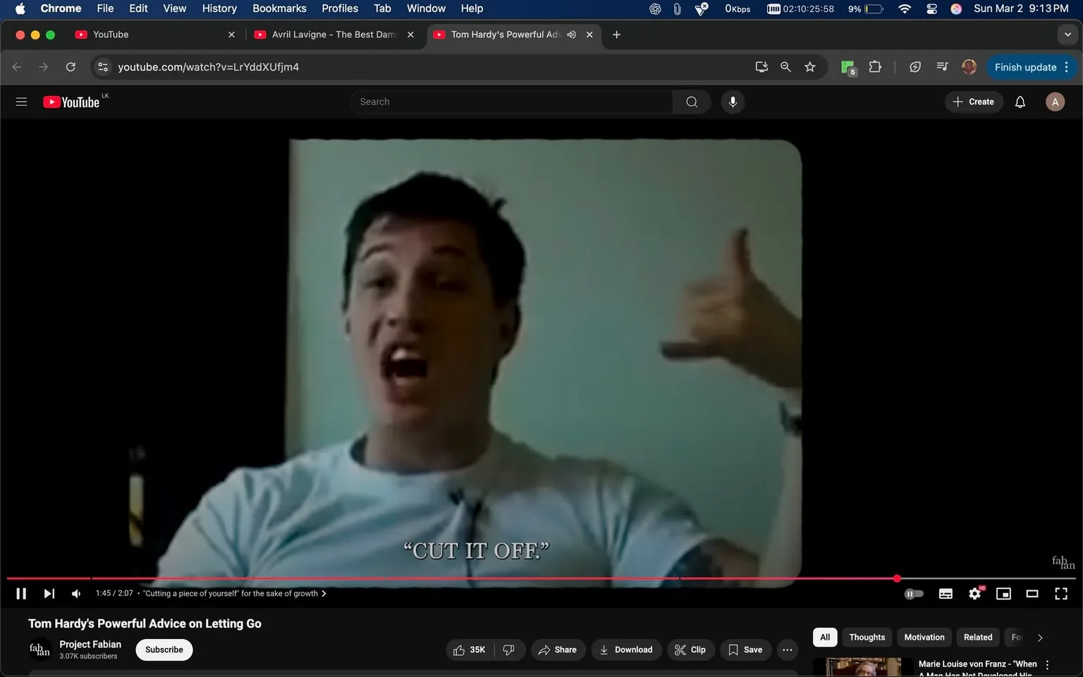 The image shows a video still from a YouTube clip titled "Tom Hardy's Powerful Advice on Letting Go." The video features a man with short, dark hair and a light skin tone, who appears to be animatedly speaking. He is wearing a plain white t-shirt and has a visible tattoo on his left arm. His facial expression is expressive, with his mouth open as if he is emphasizing a point. 

He is gesturing with his right hand, making a "call me" sign, which involves extending his pinky and thumb while the other fingers are curled. The background is a light-colored wall, possibly beige or pale green, and there is a shadowy area to the left, indicating a darker space or object that is not clearly defined.

At the bottom of the image, there is a subtitle that reads "CUT IT OFF," suggesting a key phrase from his speech. The video timeline indicates that this is a clip at 1 minute and 45 seconds into a 2-minute and 7-second video. The video is hosted on YouTube, and the channel name "Project Fabian" is visible, along with a subscriber count of 3.07K. The interface shows standard YouTube features, including options to share, download, and save the video.

Overall, the image captures a moment of dynamic expression and communication, with a focus on the speaker's animated delivery and the textual emphasis on a particular phrase.