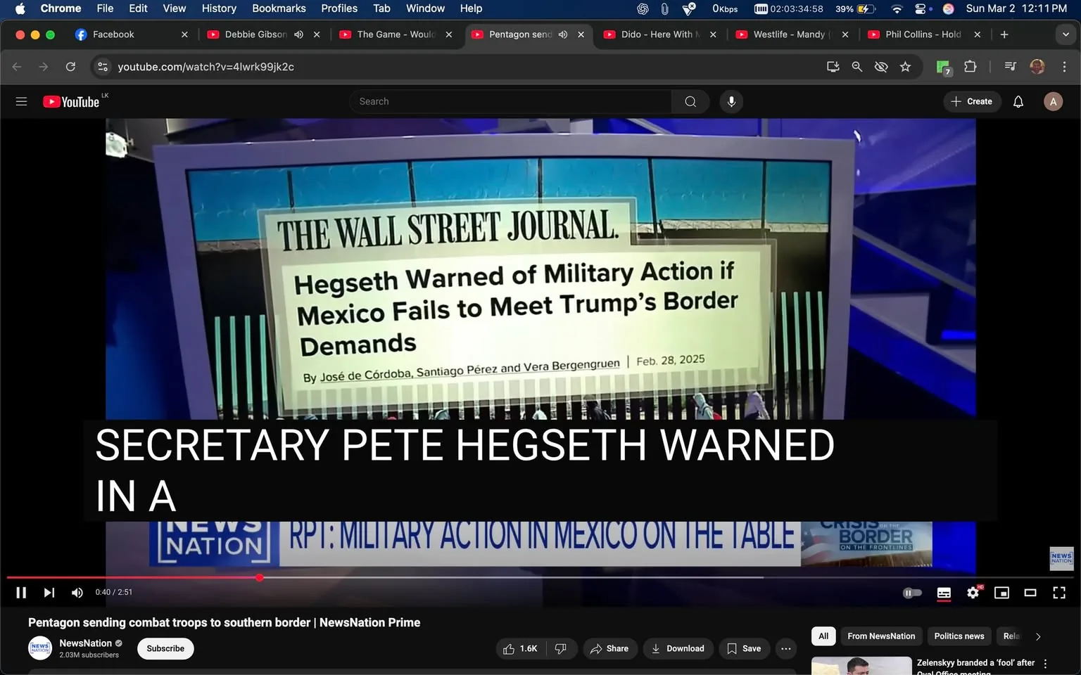 The image displays a screenshot from a video segment, likely from a news broadcast. The background features a blue and purple color scheme, with a large screen displaying text. 

At the center of the screen is a headline from "The Wall Street Journal," which reads: "Hegseth Warned of Military Action if Mexico Fails to Meet Trump's Border Demands." The byline includes the names "José de Córdoba, Santiago Pérez, and Vera Bergenruen," along with a date: "Feb. 28, 2025." The text is presented in a bold, clear font, with the publication's name prominently displayed at the top.

Below the headline, there is a lower third graphic that reads: "RPT: MILITARY ACTION IN MEXICO ON THE TABLE," indicating that this is a report or segment about potential military action related to border issues.

The bottom of the image includes a logo for "News Nation," which appears to be the broadcasting network, along with a view count of "2.03M Subscribers." The video controls are visible at the bottom, showing options to pause, save, or share the video.

The overall setting suggests a news studio environment, with a focus on political or military topics related to U.S.-Mexico relations. There are no visible people in the image, and the focus is entirely on the text and graphics displayed on the screen.