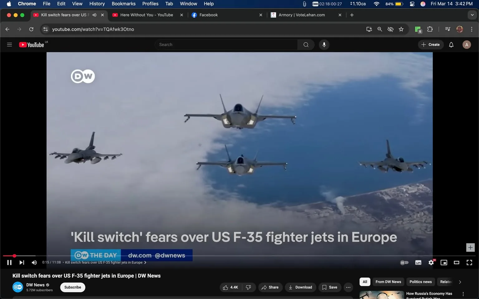 The image displays a video player interface from YouTube, featuring a segment titled "Kill switch fears over US F-35 fighter jets in Europe" from DW News. The video is currently playing, with a timestamp indicating it is 15 seconds into an 11-minute and 8-second duration.

In the video, four fighter jets are visible flying in formation against a backdrop of clouds and a body of water. The jets appear to be military aircraft, with two of them resembling the F-35 model, characterized by their angular design and stealth features. The aircraft are flying in a tight formation, with the lead jet slightly ahead of the others. The background shows a mix of blue sky and white clouds, with a hint of land or coastline visible beneath the jets.

The lower portion of the video player includes several elements: 
- The title of the video is prominently displayed in white text against a dark background.
- A blue bar indicates the current playback position.
- Below the title, there is a logo for DW News, which is a stylized representation of the letters "DW" in a circular format.
- The player controls include options to share, download, and save the video, along with a subscriber count of 5.72 million for the DW News channel.

Overall, the image captures a moment from a news segment focused on military aviation, specifically addressing concerns related to the F-35 fighter jets. The visual elements are designed to convey information clearly while maintaining a professional appearance.