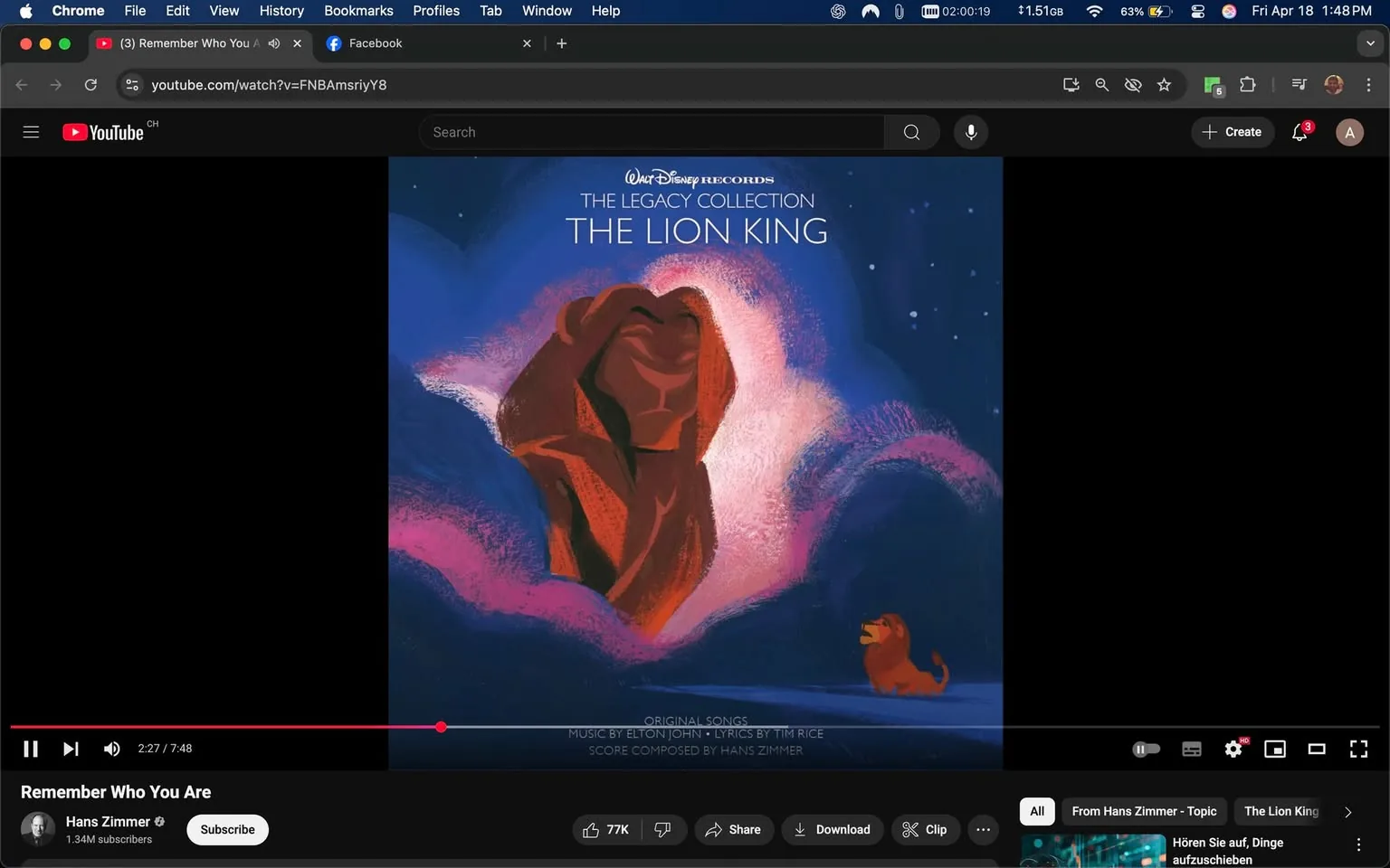 The image displays a promotional artwork for "The Lion King," specifically from "The Legacy Collection." The background features a gradient of deep blue and purple hues, suggesting a night sky with scattered stars. In the center, there is a stylized depiction of a lion, possibly representing Simba, with a strong, proud expression. The lion is rendered in warm, earthy tones, primarily shades of orange and brown, which contrast with the cooler background colors.

To the right of the larger lion, there is a smaller lion cub, also in warm tones, looking up towards the larger figure. The cub's expression appears curious and innocent. Surrounding the lions are soft, swirling clouds in pink and purple, adding a dreamy quality to the image.

At the top of the artwork, the text reads: "Walt Disney Records," followed by "THE LEGACY COLLECTION" in a bold font. Below that, "THE LION KING" is prominently displayed, indicating the title of the collection. 

At the bottom of the image, there is additional text that states "ORIGINAL SONGS," "MUSIC BY ELTON JOHN," "LYRICS BY TIM RICE," and "SCORE COMPOSED BY HANS ZIMMER," providing credits for the music associated with the film.

The overall composition is visually striking, combining elements of nostalgia and artistry, characteristic of Disney's branding. The image is designed to evoke emotions related to the beloved film and its music.