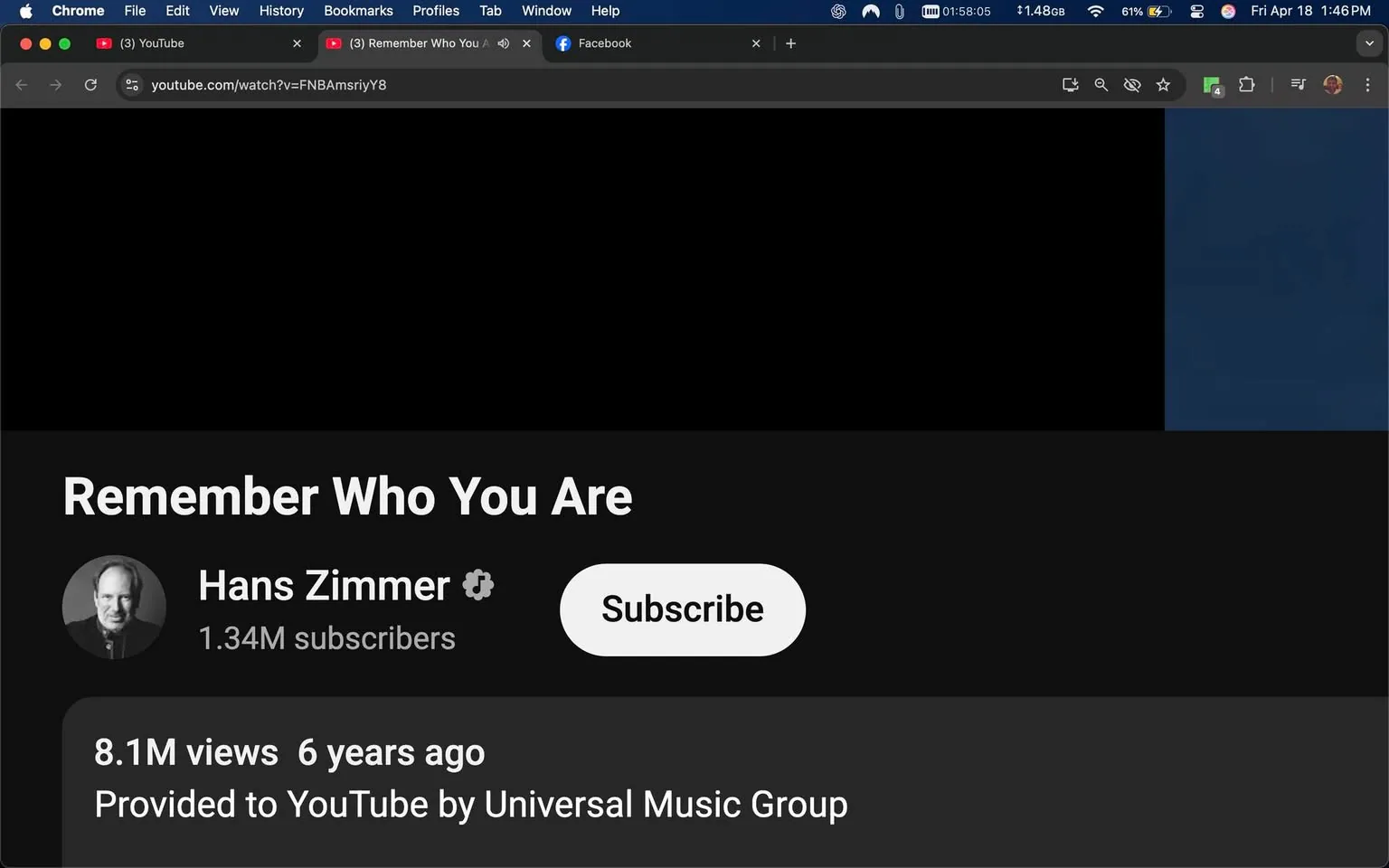 The image displays a YouTube video page featuring the title "Remember Who You Are." The video is associated with Hans Zimmer, who has a verified account indicated by a checkmark next to his name. The subscriber count is shown as 1.34 million. Below the title, there is a view count of 8.1 million, with a note stating that the video was uploaded 6 years ago. The video is provided to YouTube by Universal Music Group.

The background of the page is predominantly black, consistent with YouTube's dark mode interface. There is a prominent "Subscribe" button in white with rounded edges, located to the right of Hans Zimmer's name. The overall layout is typical of YouTube's video display, with the title and channel information clearly visible.

No people are present in the image, and there are no additional objects or products visible. The setting is purely digital, as it is a screenshot of a web browser displaying a YouTube video. The browser tabs at the top indicate that the user has multiple tabs open, including Facebook and other YouTube videos, but no specific content from those tabs is visible in this image. The time displayed on the browser indicates it is 1:46 PM on April 18, with the date also visible. 

The image does not contain any logos or trademarks beyond those associated with YouTube and Universal Music Group. There are no discernible facial expressions, clothing, or actions to describe, as the image is focused solely on the digital content of the YouTube page.