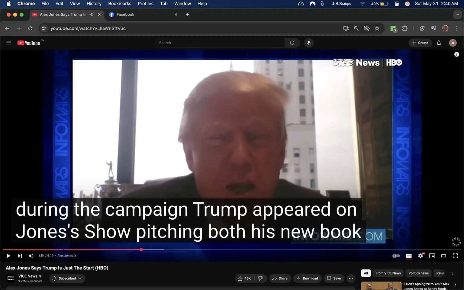 The image shows a video still from a YouTube clip featuring a man with light-colored hair and a fair complexion, seated in front of a window with a blurred cityscape visible in the background. The man appears to be speaking, with his mouth open, suggesting he is in the middle of a conversation or interview. He is wearing a dark jacket over a light-colored shirt. 

The video is framed with a blue border that includes the text "INFOWARS" prominently displayed on the left side. The bottom of the image features subtitles that read: "during the campaign Trump appeared on Jones's Show pitching both his new book." The subtitles are in white text against a black background, making them easily readable.

In the background, there are tall buildings visible through the window, indicating an urban setting. The lighting appears to be natural, coming from the window, which is bright but does not provide specific details about the outside environment due to the glare.

The video interface includes various elements typical of YouTube, such as a play button, a timeline bar, and options for liking, sharing, and subscribing. The video title, "Alex Jones Says Trump Is Just The Start (HBO)," is displayed above the video player, along with the channel name "VICE News" and the subscriber count of 9.22M.

Overall, the image captures a moment from a video interview, highlighting the speaker's engagement in a discussion, with clear branding and context provided by the video platform's interface.