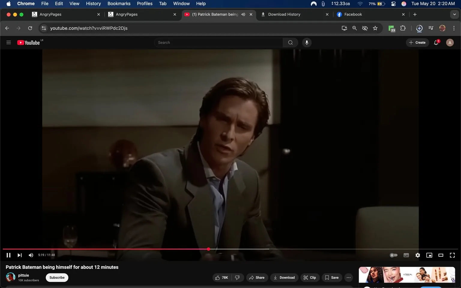 The image shows a scene from a video, likely a film or television show. The video player interface is visible at the bottom, displaying a play bar with a timestamp indicating it is at 5:19 out of a total of 11:48 minutes. The video is titled "Patrick Bateman being himself for about 12 minutes," and the channel name is "pittsie," which has 10K subscribers.

In the foreground, a man is seated at a table. He has a serious expression on his face, with his eyebrows slightly furrowed, suggesting he is engaged in a conversation or deep in thought. His hair is styled in a neat, slightly wavy manner. He is wearing a tailored suit that appears to be gray, with a light blue dress shirt underneath. The suit jacket has a notch lapel, and the shirt is unbuttoned at the collar, giving a slightly relaxed appearance.

The background features a dimly lit room with a smooth, light-colored wall. There is a decorative object, possibly a vase or sculpture, in a reddish hue on a shelf or table behind him. To the right, a dark door is partially visible, indicating the setting is likely an indoor space, possibly an office or a private room.

On the table in front of the man, there is a black object, possibly a phone or a small device, but it is not clearly identifiable. There are also two wine glasses, one of which is partially filled, suggesting that the scene may involve a social or business meeting.

The overall atmosphere of the image is serious and somewhat tense, indicated by the man's expression and the subdued lighting. The video appears to be a clip from a larger narrative, likely involving themes of identity or social interaction, given the character's known background.