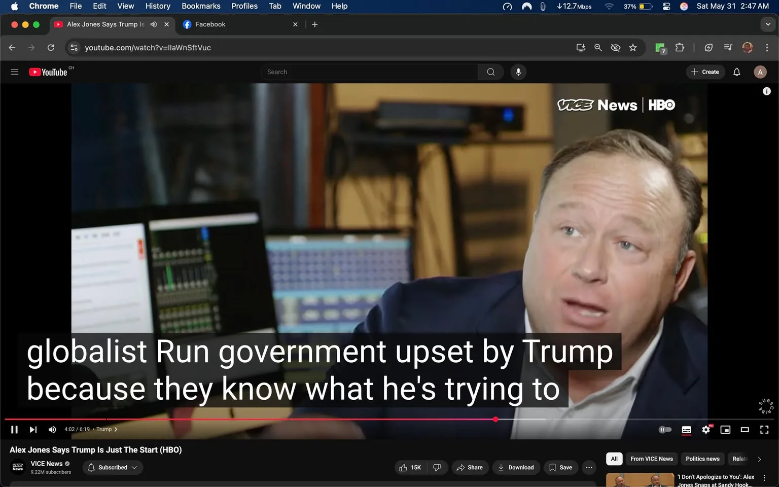 The image shows a video still from a YouTube clip titled "Alex Jones Says Trump Is Just The Start (HBO)" by VICE News. The video is currently playing, with a timestamp indicating it is at 4 minutes and 2 seconds out of a total duration of 6 minutes and 19 seconds.

In the foreground, a man is speaking. He has short, light brown hair that is combed to the side and appears to be in his late 40s to early 50s. He is wearing a dark blue blazer over a light-colored shirt. His facial expression is animated, suggesting he is engaged in a passionate discussion. The background is slightly blurred but shows a workspace with multiple computer screens. One screen displays a digital audio mixing interface with various sliders and indicators, while another screen has text that is not clearly readable.

At the bottom of the image, there is a subtitle overlay that reads: "globalist Run government upset by Trump because they know what he's trying to." This text is in white font against a dark background, making it easily readable.

The video player interface is visible at the bottom, showing options to like, share, and download the video, along with the subscriber count of the channel (9.22M subscribers). The video is being viewed in a web browser, with the title and other tabs visible at the top, including a Facebook tab and a Chrome browser interface.

The setting appears to be a studio or office environment, likely related to media production, given the presence of audio equipment and screens. The overall atmosphere suggests a serious discussion or interview format.