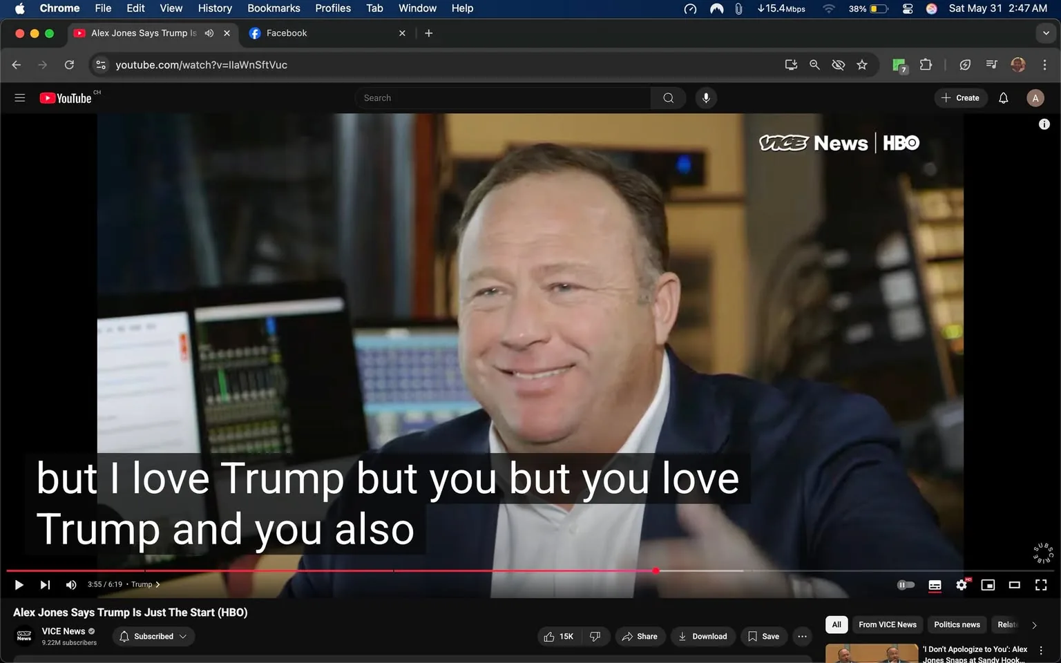 The image features a man with a light complexion and short, dark hair, smiling at the camera. He is wearing a dark blazer over a white shirt, which is partially visible. The background includes several computer screens, some displaying audio mixing software and others showing text documents. The setting appears to be a studio or office environment, likely related to media production, given the presence of audio equipment and monitors.

In the foreground, there are subtitles displayed on the screen, which read: "but I love Trump but you but you love Trump and you also." The text is bold and white, set against a dark background, making it easily readable. The man is gesturing with his hands, suggesting a conversational or animated tone.

The logo in the top right corner indicates that this is a segment from "VICE News" on HBO, with the channel's branding clearly visible. The video player interface at the bottom shows options for sharing, subscribing, and other typical YouTube functionalities.

Overall, the image captures a moment of discussion or interview, with a focus on the man's expression and the technology surrounding him. The environment is professional, likely aimed at producing content for a media audience.
