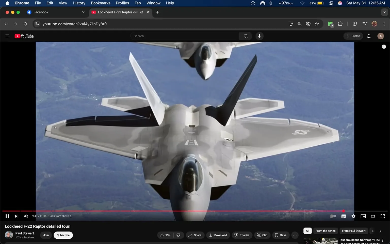 The image depicts two Lockheed F-22 Raptor fighter jets flying in formation against a backdrop of mountainous terrain. The aircraft are shown from a slightly elevated angle, with the foreground jet prominently displayed while the second jet is positioned slightly above and behind it.

**Details of the Aircraft:**
- The leading F-22 has a sleek, angular design typical of modern stealth fighters, characterized by its sharp edges and smooth surfaces.
- The color scheme is primarily a light gray with darker gray accents, enhancing its stealth capabilities.
- The wings are swept back, and the aircraft features distinctive vertical stabilizers that are angled outward.
- The cockpit is visible, showcasing a dark canopy that reflects some light, indicating the presence of a pilot inside.
- The underside of the wings has a black section, possibly housing weaponry or fuel tanks.
- The tail section of the aircraft displays a logo, which appears to be a stylized representation of a bird or eagle, indicative of military insignia.

**Background:**
- The background consists of rolling hills and mountains, with a mix of green vegetation and rocky terrain. The sky is clear, suggesting good flying conditions.
- There are no visible signs of human activity or structures in the background, emphasizing the natural landscape.

**Text and Branding:**
- The image includes a YouTube interface at the bottom, indicating that this is a video still. The title "Lockheed F-22 Raptor detailed tour!" is visible, along with the channel name "Paul Stewart" and subscriber count.
- There are playback controls visible at the bottom of the image, including buttons for play, pause, and volume adjustment.

Overall, the image captures a moment of aerial display featuring advanced military technology, set against a scenic backdrop, while also providing context through the YouTube interface.