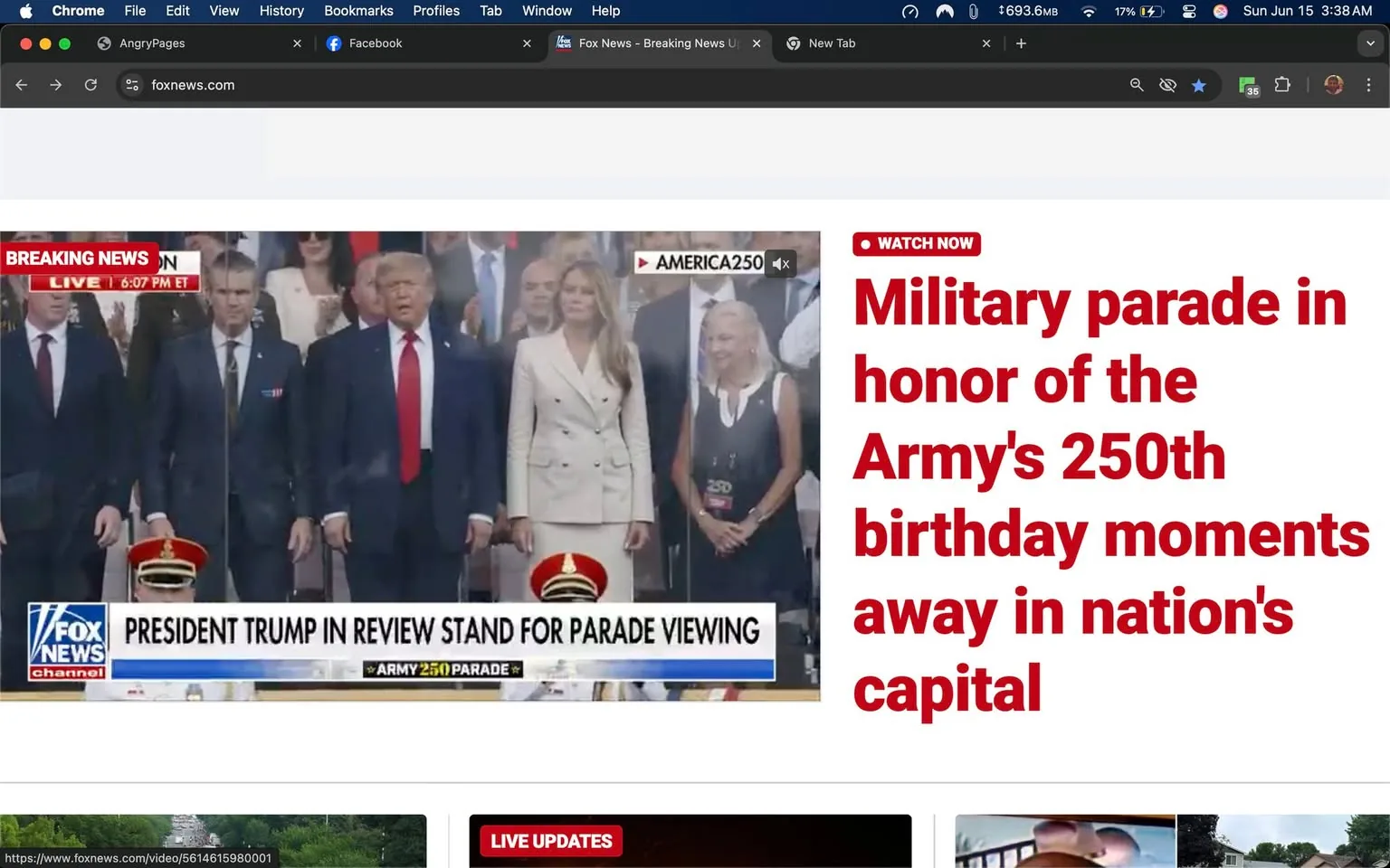 The image displays a news website interface, specifically from Fox News, featuring a breaking news segment. The top portion of the image includes a red banner labeled "BREAKING NEWS" with a timestamp indicating "6:07 PM ET." Below this banner, there is a video frame showing a group of individuals standing together, presumably at a military parade event.

In the foreground, the text reads "PRESIDENT TRUMP IN REVIEW STAND FOR PARADE VIEWING," indicating that the scene is related to a military parade. The bottom of the video frame features a logo for Fox News, identifiable by its blue and white color scheme, along with the text "ARMY 250 PARADE."

The individuals visible in the image include a man in a dark suit with a tie, standing next to a woman in a white double-breasted blazer. The woman has long, straight hair and appears to be looking forward. To the right of the woman, another individual is seen wearing a black dress and holding a sign or card. The expressions of the individuals are neutral, and they appear to be focused on the event.

In the background, there are several other people, some of whom are partially obscured. The setting appears to be an outdoor venue, likely in a city, given the formal nature of the event and the presence of a crowd. The overall atmosphere suggests a significant public occasion, possibly celebrating the Army's 250th birthday, as indicated by the headline on the website.

The image also includes a navigation bar at the top with options like "File," "Edit," "View," "History," "Bookmarks," "Profiles," and "Tab," indicating that this is a web browser interface. The bottom section of the image shows additional content, including "LIVE UPDATES," but specific details are not visible in this cropped view.

Overall, the image captures a moment from a formal event, with a focus on notable figures and the context of a military celebration.