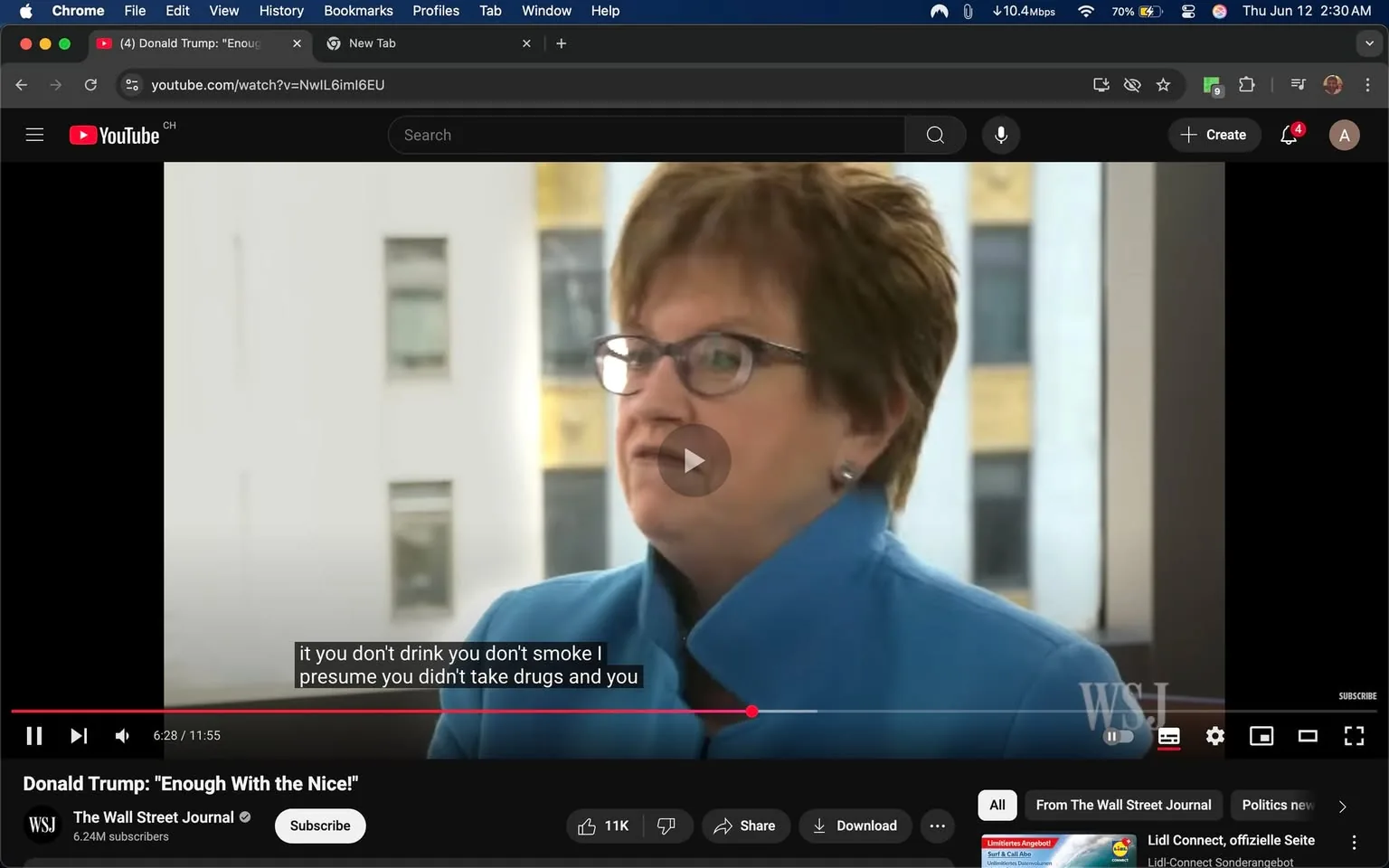 The image shows a woman speaking in an interview setting. She has short, light brown hair styled in a slightly tousled manner and is wearing glasses with a thin frame. Her outfit consists of a bright blue blazer, which has a high collar and is buttoned at the neck, giving her a professional appearance. The background features a modern interior with large windows, allowing natural light to illuminate the space. The walls appear to be a light color, possibly white or off-white, and there are hints of a building's exterior visible through the windows, suggesting an urban environment.

In the foreground, there is a video player interface from YouTube, indicating that this is a video clip. The video is titled "Donald Trump: 'Enough with the Nice!'" and is published by The Wall Street Journal, which is visible in the bottom left corner along with the subscriber count of 6.24 million. The video is currently at 6 minutes and 28 seconds into an 11-minute and 55-second runtime. Below the video, there are options to pause, play, and adjust the volume, as well as buttons for sharing and downloading.

The woman appears to be engaged in a serious discussion, with her facial expression showing focus and intensity. Her body language suggests she is making a point, possibly in response to a question. The text overlay on the video includes subtitles, which read, "if you don't drink you don't smoke I presume you didn't take drugs and you," indicating the topic of conversation may involve personal choices or lifestyle discussions.

Overall, the setting is professional, and the woman’s attire and demeanor reflect a formal interview context. The visual elements combine to create an informative atmosphere typical of news or opinion segments.