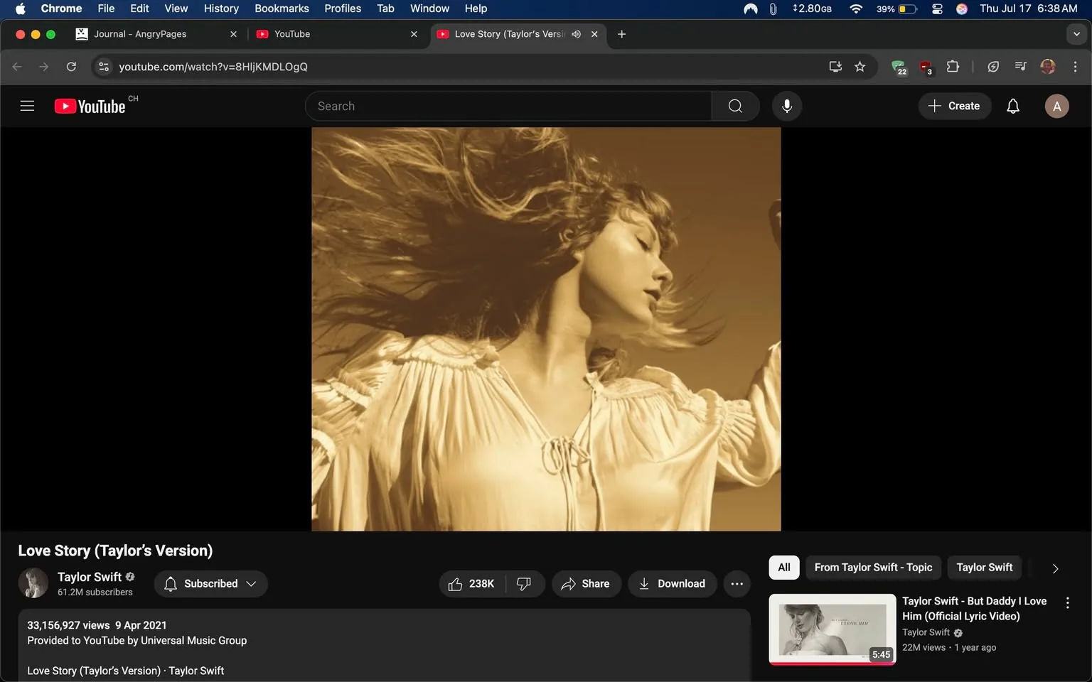 • subjects: woman with long hair, flowing blouse  
• actions: turning head, hair blowing, arms raised  
• context: YouTube interface, video title "Love Story (Taylor’s Version)", Taylor Swift channel, view count, date posted  
• risks: none observed  
• mood: dreamy, nostalgic, uplifting, ethereal