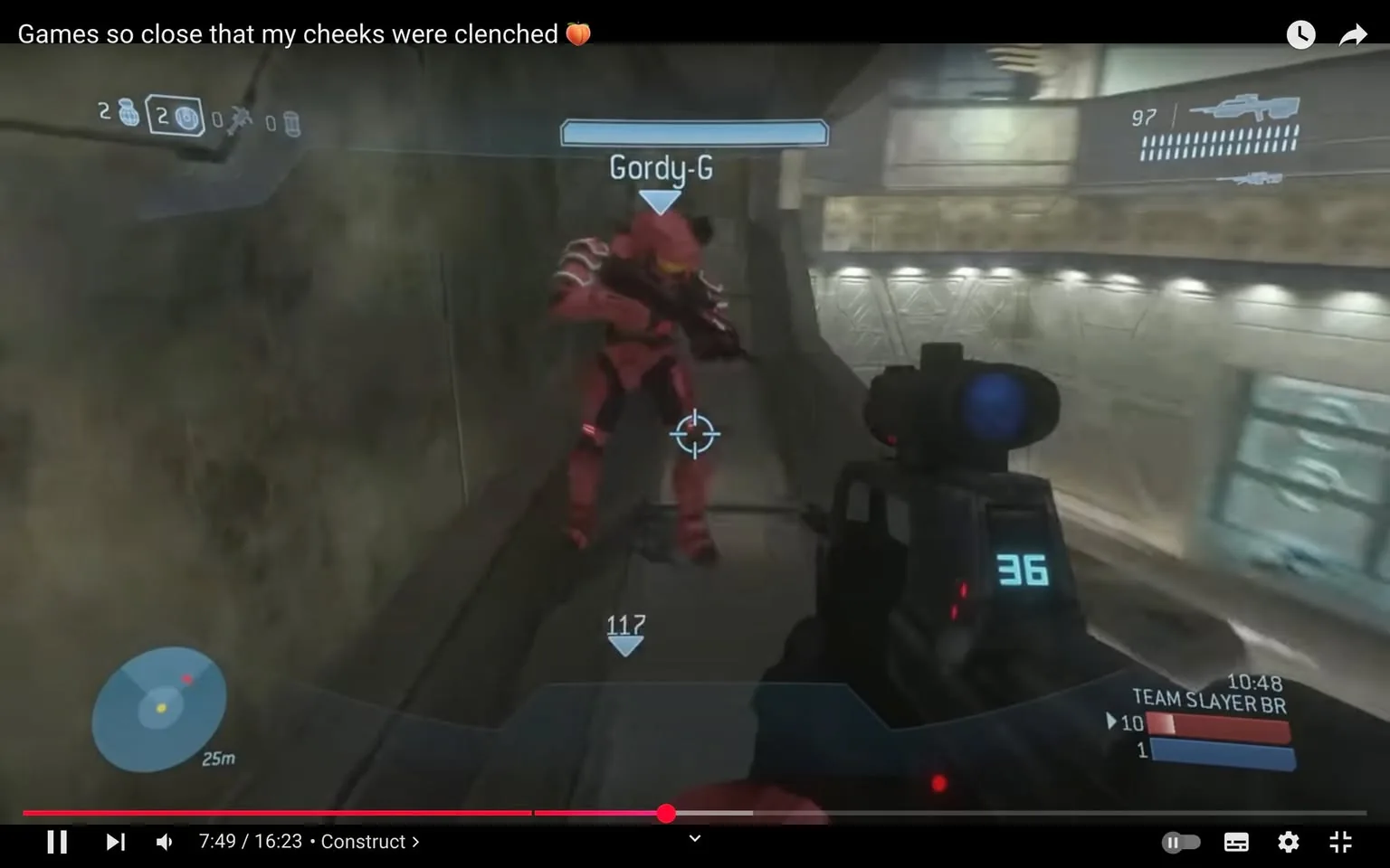 The image depicts a scene from a video game, likely from the "Halo" series, showcasing a first-person shooter perspective. The player is aiming a weapon, indicated by the crosshair in the center of the screen. The weapon appears to be a Battle Rifle, as suggested by the HUD (Heads-Up Display) elements. The HUD displays the player's current ammunition count (36 rounds) and a health indicator (117), along with a mini-map showing a distance of 25 meters to a target.

In the foreground, the player character is holding the weapon steady, suggesting a moment of tension or focus. The character is wearing a futuristic armor suit, which is predominantly black with blue accents. The armor design is sleek and angular, typical of the "Halo" aesthetic. 

In the background, another character, identified by the name "Gordy-G," is visible. This character is clad in bright red armor, which stands out against the muted tones of the environment. The red armor features some glowing elements, possibly indicating health or power status. Gordy-G appears to be in a defensive stance, holding a weapon, which implies an imminent confrontation. The positioning of both characters suggests they are in close proximity, heightening the tension of the moment.

The environment is a dimly lit corridor with metallic walls, featuring a textured surface that adds depth to the scene. The lighting is soft, with some illuminated panels along the walls, creating a slightly ominous atmosphere. The overall tone of the image conveys a sense of urgency and anticipation, typical of competitive gaming scenarios.

The text overlay at the top reads, "Games so close that my cheeks were clenched," which adds a humorous yet relatable commentary on the intensity of the gameplay. This suggests that the moment captured is part of a high-stakes situation, where players are deeply engaged and possibly anxious about the outcome.

Overall, the composition emphasizes the action and interaction between the characters, with the HUD providing essential gameplay information. The visual elements work together to create a vivid snapshot of a competitive gaming experience, highlighting both the excitement and tension inherent in such scenarios.