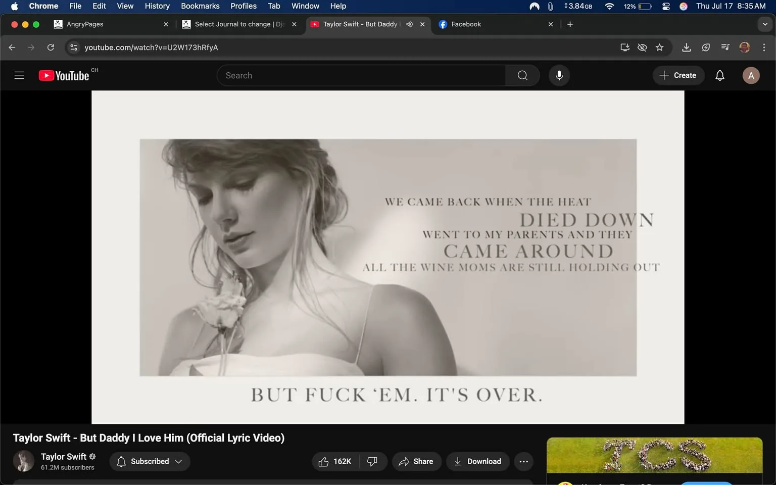 The image is a lyric video for the song "But Daddy I Love Him" by Taylor Swift. It features a close-up of a woman with light brown hair, styled in soft waves, wearing a white dress with thin straps. She appears contemplative, with her head slightly tilted down and a delicate flower accessory in her hair. 

The background is a muted, light color, enhancing the focus on her expression. Text overlays include lyrics from the song, such as "WE CAME BACK WHEN THE HEAT DIED DOWN" and "BUT FUCK 'EM. IT'S OVER." This text is arranged in a visually appealing manner, with varying font sizes and weights.

The overall mood is reflective and somewhat somber, indicated by the woman's expression and the color palette. There are no visible risks or sensitive content in the image. The composition emphasizes the emotional weight of the lyrics, creating a connection between the visual and the auditory experience.