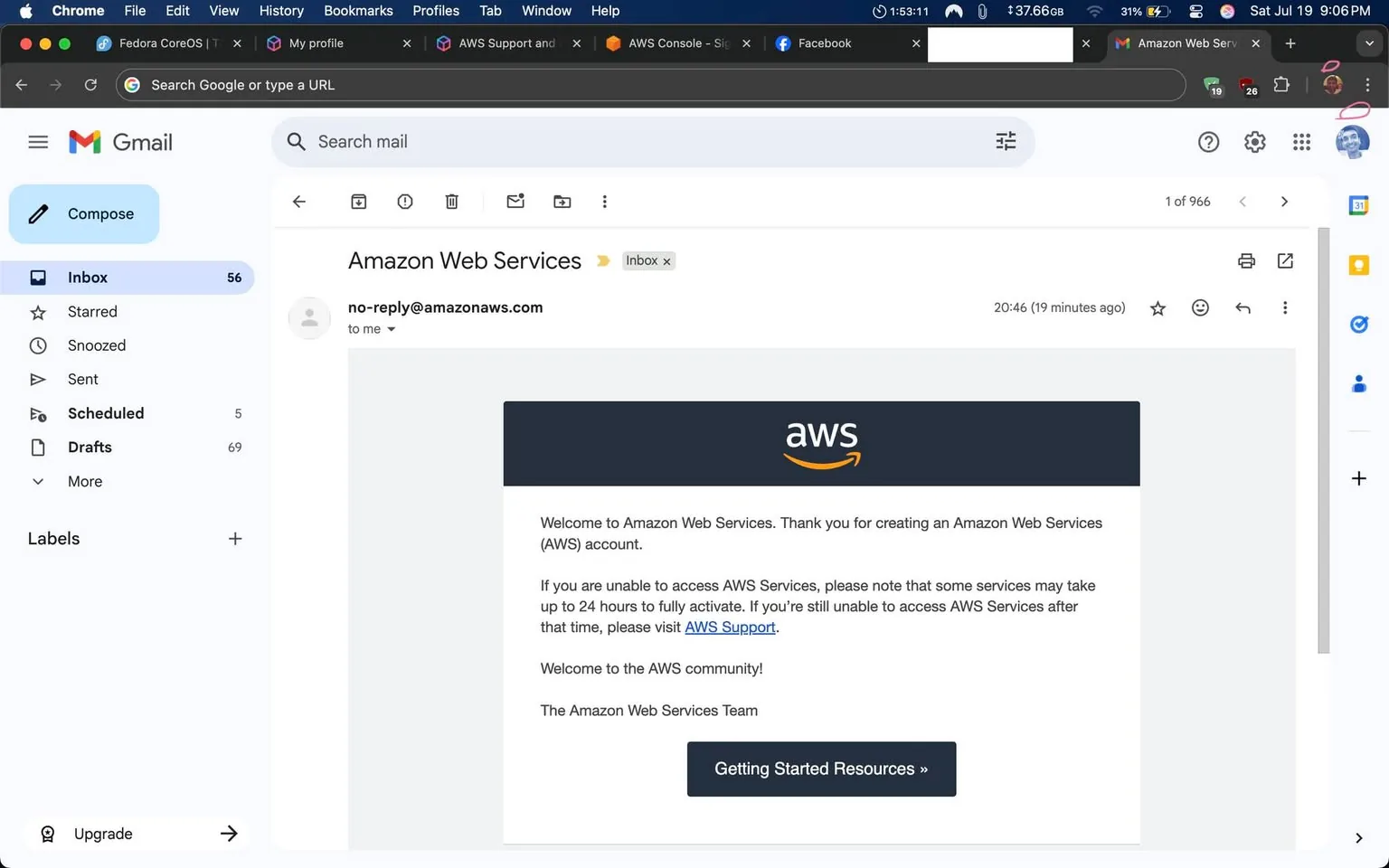 The image displays an email interface from Gmail, showcasing a message from "no-reply@amazonaws.com" with the subject line "Amazon Web Services." The email is welcoming the recipient to Amazon Web Services (AWS) and thanks them for creating an AWS account. 

The email body contains the following key points:

1. **Welcome Message**: It expresses gratitude for account creation.
2. **Access Information**: It informs the recipient that some AWS services may take up to 24 hours to activate fully.
3. **Support Link**: A suggestion to visit AWS Support if access issues persist.
4. **Community Welcome**: It concludes with a warm welcome to the AWS community.

The email features the AWS logo prominently, with the "AWS" text in white against a dark background, conveying a professional tone. A button labeled "Getting Started Resources" is included, indicating an intent to guide the user in utilizing AWS services. The overall tone is informative and supportive, aimed at easing the onboarding process for new users. No explicit or controversial content is present.
