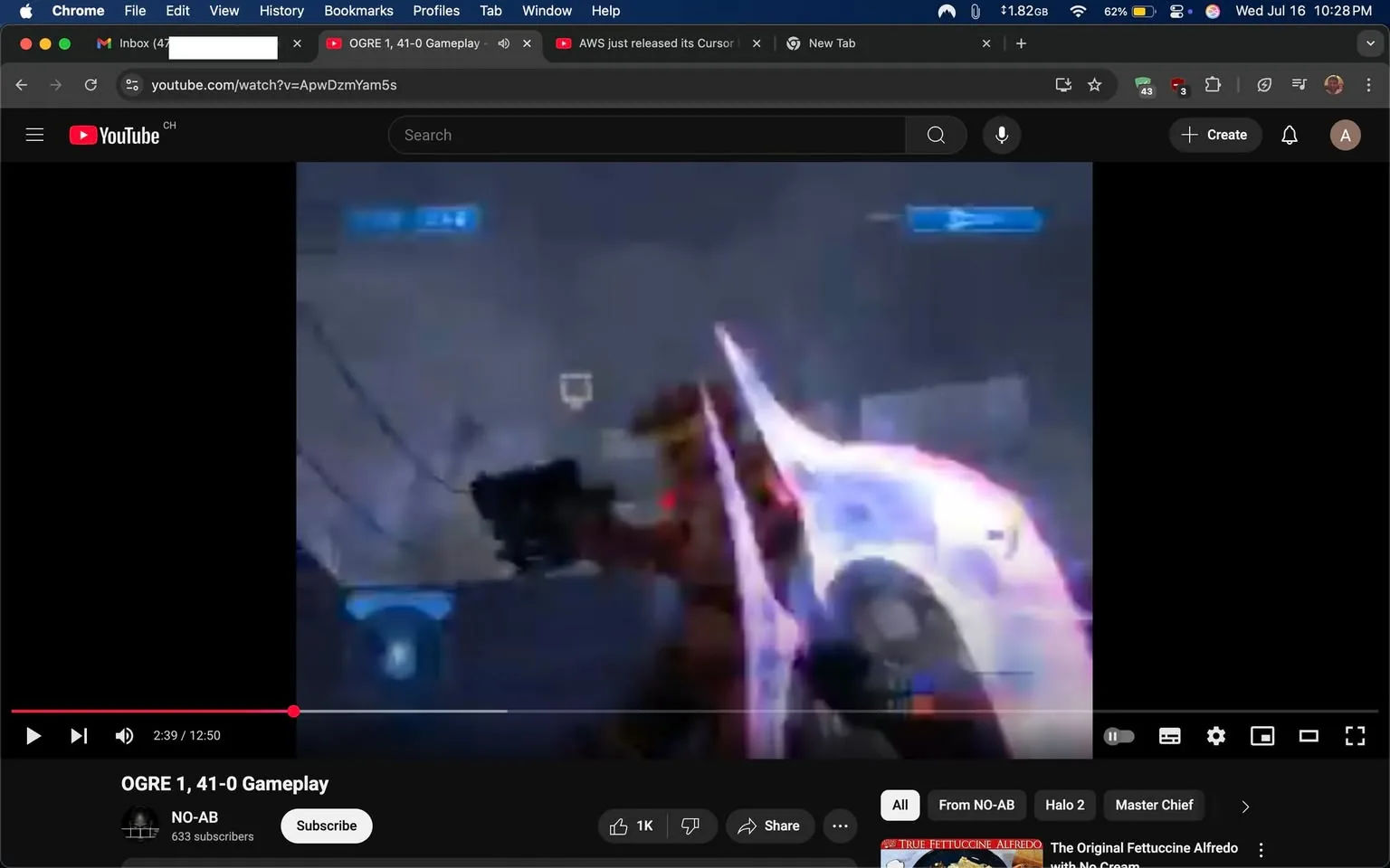 The image shows a gameplay video from a YouTube channel titled "NO-AB," featuring a scene from the game "Halo 2." 

**Subjects & Objects:** 
- The main subject is a character in armor, likely representing the game's protagonist, Master Chief. The character is holding a weapon, possibly a plasma rifle, and has a glowing energy shield.

**Actions & Relationships:** 
- The character appears to be engaged in combat, aiming the weapon as if preparing to shoot. The energy shield is active, indicating defensive readiness.

**Context & Text:** 
- The video is at the 2:39 mark of a 12:50 minute gameplay session. The screen displays a health bar and other HUD elements typical of video games. The channel has 633 subscribers.

**Risks & Sensitivity:** 
- The content depicts video game violence, which is typical for action games, but there are no explicit or graphic elements.

**Mood & Subtext:** 
- The tone is intense and action-oriented, with a focus on gameplay dynamics. The lighting is dim, typical of a combat scenario in a sci-fi setting.