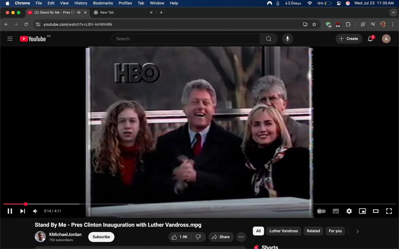 The image captures a moment from a public event, likely an inauguration, with a focus on a group of individuals standing together. The setting appears to be outdoors, with a backdrop that suggests a significant occasion, possibly in a city like Washington, D.C., given the context of an inauguration.

In the foreground, a man with short, light-colored hair is prominently featured, wearing a dark suit and a red tie. He has a broad smile on his face, exuding joy and enthusiasm. His body language, with hands raised and clapping, suggests he is celebrating or responding to something uplifting happening around him. To his right stands a woman with blonde hair, styled in soft waves, wearing a black coat and a patterned scarf. She is also smiling, which adds to the overall atmosphere of happiness and excitement in the scene.

Next to her is a young girl with curly hair, dressed in a dark jacket over a red top. Her expression is more subdued compared to the adults, and she appears to be observing the event with a thoughtful demeanor. Behind them, a man with gray hair and glasses is partially visible, watching the proceedings with a neutral expression.

The image is framed with a logo for HBO, suggesting that this moment was captured as part of a televised event or special. The presence of the logo adds a layer of authenticity, indicating that this was a significant moment likely broadcasted to a wide audience.

The emotions conveyed in the image are predominantly positive, with smiles and expressions of joy reflecting the celebratory nature of the occasion. The combination of the adults’ enthusiasm and the girl’s contemplative look creates a dynamic contrast, hinting at the different perspectives people may have during such monumental events.

The overall tone of the image is one of celebration and unity, capturing a moment that likely resonated with many viewers at the time. The setting, combined with the expressions of the individuals, evokes a sense of historical significance, marking a moment of change and hope.