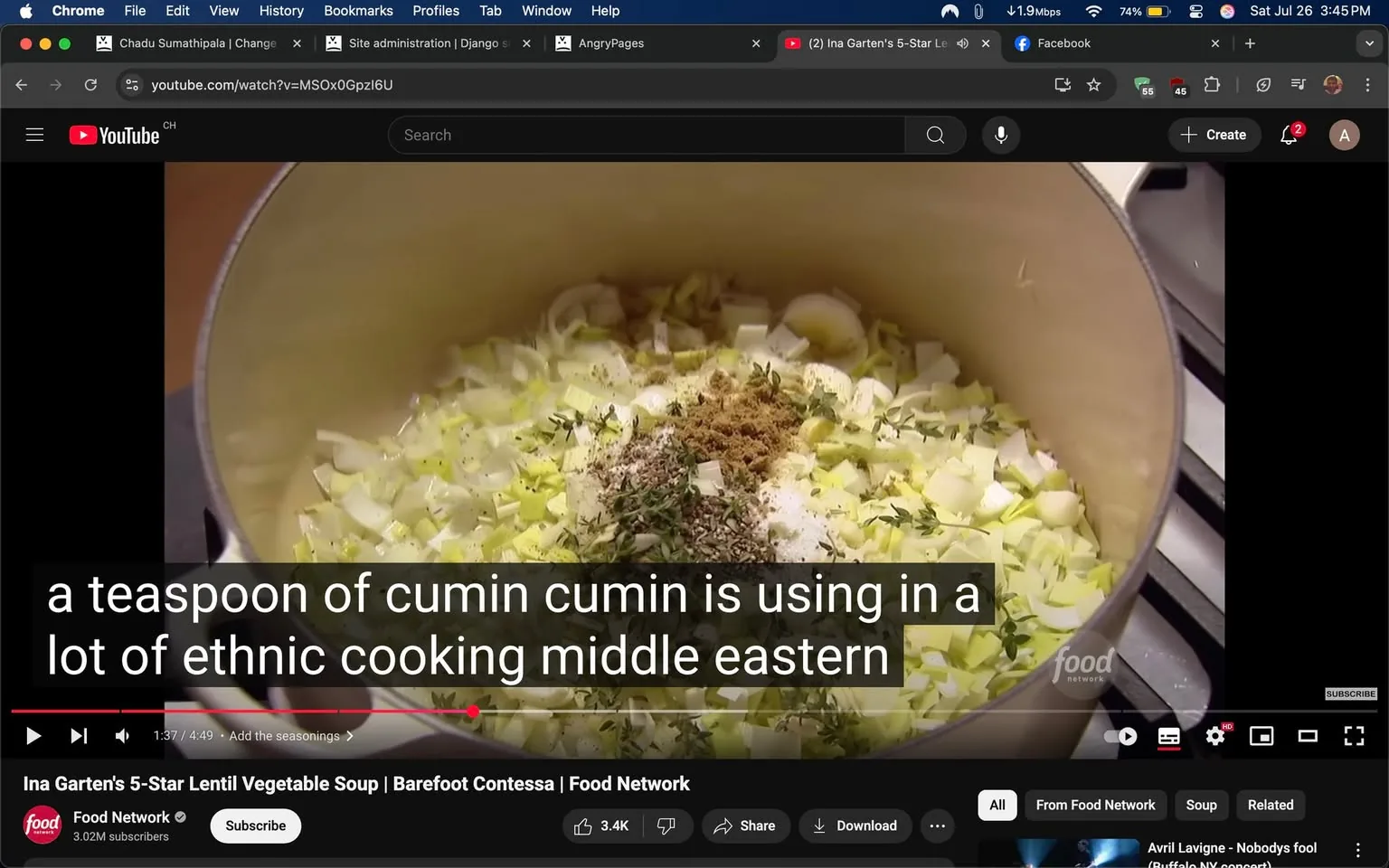 The image captures a moment from a cooking video, specifically featuring a pot filled with chopped vegetables and spices. The pot, which appears to be a heavy-duty, light-colored enameled cast iron, is situated on a stovetop. The interior of the pot reveals a mixture of finely chopped leeks and other vegetables, likely sautéed to create a flavorful base for a soup.

Scattered atop the vegetables are various spices, including a teaspoon of cumin, which is prominently mentioned in the caption. The spices are in earthy tones, with the cumin appearing as a light brown powder. Other herbs and seasonings, such as thyme and possibly salt and pepper, are also visible, adding a touch of green and gray to the mixture. The overall composition suggests a focus on creating a hearty, aromatic dish, likely a lentil vegetable soup, as indicated by the video title.

The video is part of a cooking show hosted by Ina Garten, known as the "Barefoot Contessa." The branding is subtly present in the bottom left corner, showcasing the Food Network logo. The video has garnered a significant number of views and likes, indicating its popularity among viewers who appreciate Garten's approachable yet sophisticated cooking style.

The caption overlay adds context, mentioning the use of cumin in ethnic cooking, particularly in Middle Eastern cuisine. This highlights the cultural significance of the ingredients being used and suggests that the dish may draw inspiration from diverse culinary traditions.

The setting is warm and inviting, typical of Garten's kitchen aesthetic, which often features rustic elements and a cozy atmosphere. The soft lighting enhances the colors of the vegetables and spices, making them look fresh and vibrant. The overall tone of the image conveys a sense of comfort and home-cooked goodness, inviting viewers to engage with the cooking process and perhaps try the recipe themselves.

In summary, this image encapsulates a moment of culinary creativity, showcasing the preparation of a delicious and wholesome soup while emphasizing the importance of spices in enhancing flavor. It reflects the joy of cooking and the cultural richness that comes with it, making it appealing to both novice cooks and seasoned chefs alike.