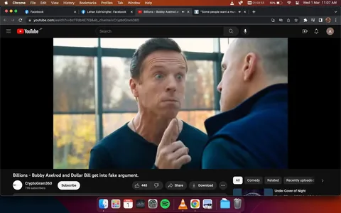 The image is a screenshot from the TV show "Billions," featuring a scene with Bobby Axelrod and Dollar Bill engaged in a tense conversation. Bobby Axelrod is prominently in the foreground, displaying an intense expression, with his finger pointed towards Dollar Bill, who is slightly blurred and facing away from the camera. The setting is indoors with large windows in the background, allowing natural light to filter through, highlighting the seriousness of the interaction. Bobby Axelrod is wearing a dark-colored shirt, and his demeanor suggests a heated argument. The mood is confrontational, emphasized by the close proximity of the characters. The video is hosted on YouTube, labeled with the title "Billions - Bobby Axelrod and Dollar Bill get into fake argument." It is uploaded by the channel CryptoGram360. The image captures a pivotal moment of dialogue typical of the series' dramatic style.
