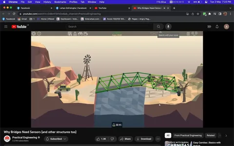 This screenshot features a video titled "Why Bridges Need Sensors (and other structures too)" from the YouTube channel "Practical Engineering." The visual is a simulation environment depicting a bridge in a desert landscape. The bridge is visibly green and seems to be part of a structural engineering simulation or video game, possibly demonstrating bridge design or stress testing. Below the bridge, there's a body of water, indicating a challenge in the simulation to span across it.
On the left, a vehicle is positioned near a rocky cliff, and a windmill is visible, adding to the desert theme with sparse vegetation like cacti. An interface overlay shows budget details, indicating "$11,784" spent from a budget of "$15,000," with a stress percentage of "32.4%," suggesting the bridge's load capacity or structural analysis.
- Title: "Why Bridges Need Sensors (and other structures too)"
- Channel / profile: "Practical Engineering"
- Site / app: "YouTube"