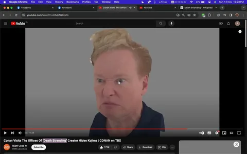 The image is a screenshot from a YouTube video titled "Conan Visits The Offices Of 'Death Stranding' Creator Hideo Kojima | CONAN on TBS," available on the Team Coco channel. The scene features a digital rendering of Conan O'Brien. The rendering captures a close-up of his face with an exaggerated and humorous expression, characterized by a furrowed brow and pursed lips, suggesting a dramatic or playful mood. The background is a plain gray, emphasizing the character's features. This rendering may be an in-game model or a stylized version of Conan, given the context of his visit to the offices of Hideo Kojima, the creator of the game "Death Stranding." The top of the screen shows multiple browser tabs open, indicating multitasking or research, while the bottom displays video engagement metrics such as likes and subscribers, highlighting audience interaction. The composition is focused on humor and novelty, typical of Conan's comedic style.