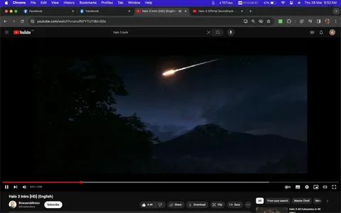 The screenshot captures a YouTube video titled "Halo 3 Intro [HD] (English)" from the channel BowsersMinion. The scene shows a nighttime landscape with a meteor or object burning brightly as it streaks across the dark sky, casting a trail of light. Silhouettes of trees and a mountain appear in the foreground, contributing to a serene yet dramatic atmosphere. The lighting emphasizes the contrast between the bright meteor and the dark surroundings. The video is related to the game "Halo 3," which features the character Master Chief, although no characters are visible in this frame.
- Title: "Halo 3 Intro [HD] (English)"
- Channel / profile: "BowsersMinion"
- Site / app: "YouTube"
