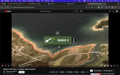 ```
The image shows a screenshot from a YouTube video titled "Wargame: Red Dragon is a 'Modern' Military Wargame." The channel name is Rimmy Downunder. The video frame displays part of a strategic map from the game "Wargame: Red Dragon." In the foreground, there is a section of coastline with a highlighted area marked by an orange line, suggesting a boundary or strategic zone. In the center of this area, a label "BARAK II" is displayed, indicating a unit or asset within the game. The label includes icons, possibly representing the type of unit or its capabilities. The map features terrain details such as roads, fields, and water, providing a strategic overview typical of military strategy games. The interface elements are clearly designed to convey tactical information to the player. The interface and map design are crucial in illustrating the game's focus on military strategy and planning.