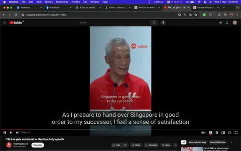 1) Rich description: The video frame captures Lee Hsien Loong speaking at a podium during a May Day Rally. Wearing a red shirt, he stands in front of a backdrop with the word "today" visible in the top right corner, indicating the branding of the channel presenting the video. Lee Hsien Loong appears to be in a reflective and emotional state as he prepares to address the audience. The caption on the screen reads, "As I prepare to hand over Singapore in good order to my successor, I feel a sense of satisfaction," indicating the subject of his speech concerning leadership transition. The setting is indoors, with a focus on Lee Hsien Loong at the microphone, conveying a serious and poignant mood. The lighting is bright, centered on him, emphasizing the importance of his message. The image is framed to include the digital interface of the YouTube platform, with various browser tabs and video control options visible on the screen.
2) On-screen text block:
- Title: "PM Lee gets emotional in May Day Rally speech"
- Channel / profile: "TODAYonline"
- Site / app: "YouTube"
- Captions / subtitles: "As I prepare to hand over Singapore in good order to my successor, I feel a sense of satisfaction"